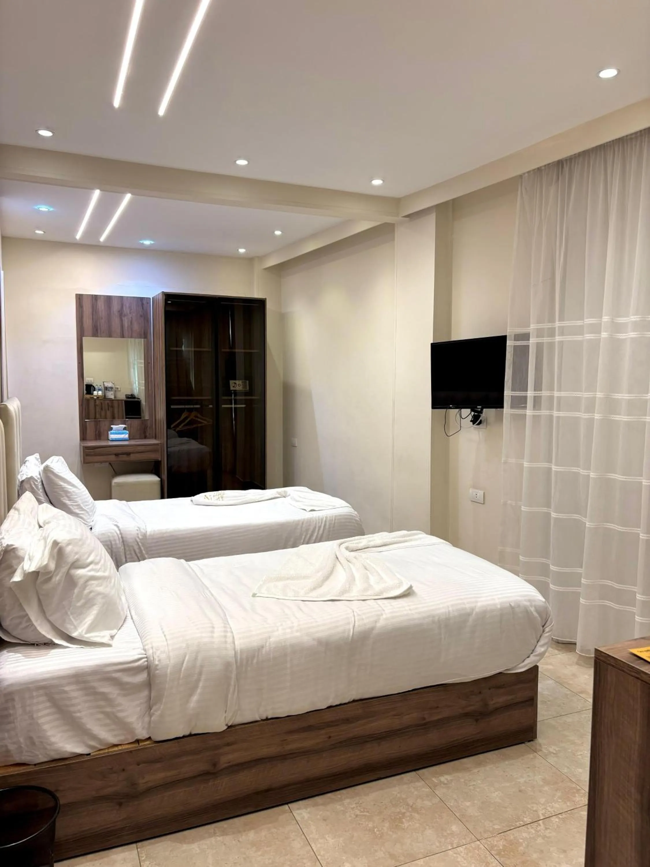 Bed in The Palace Pyramids View Hotel