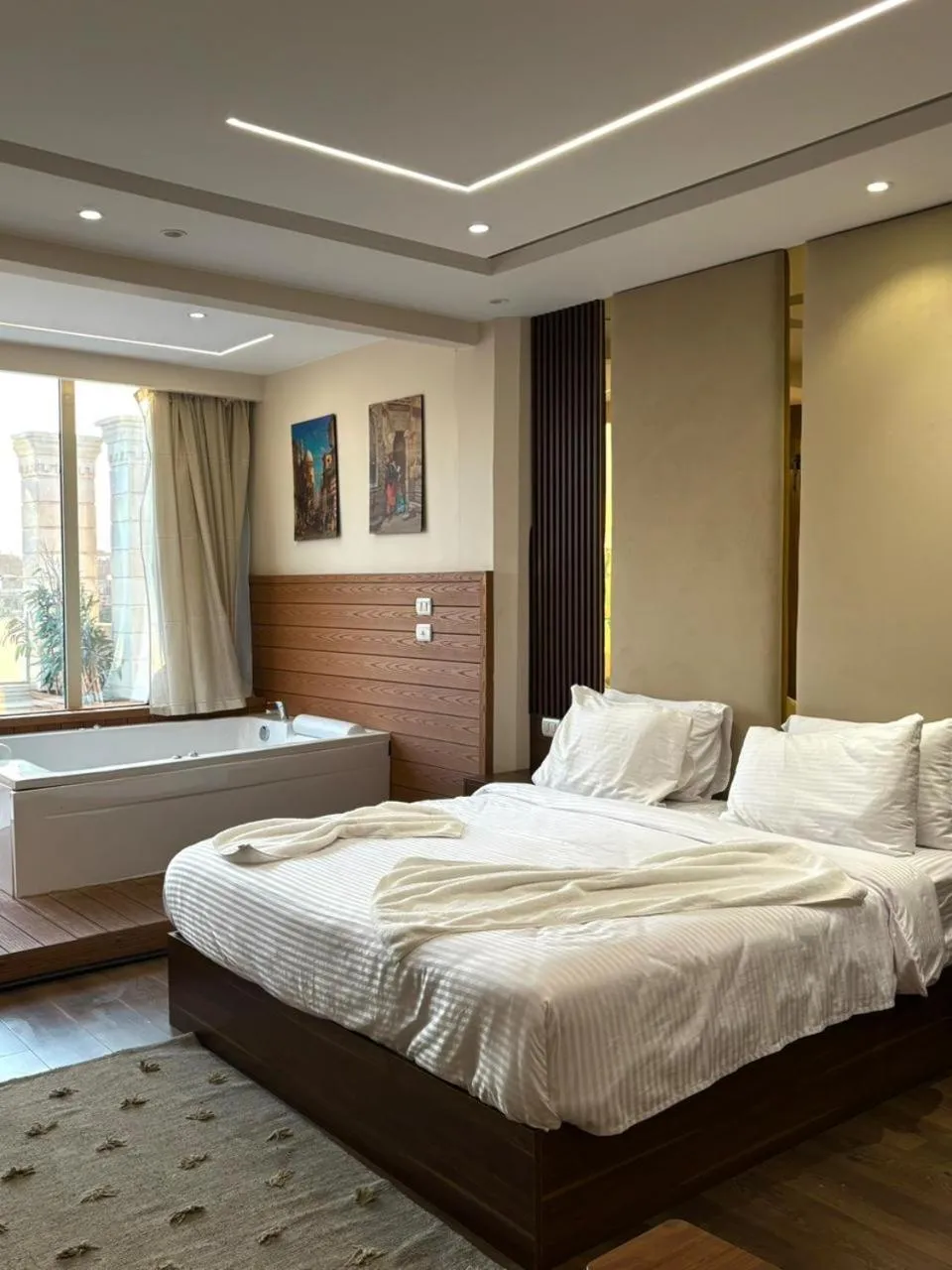 Bed in The Palace Pyramids View Hotel