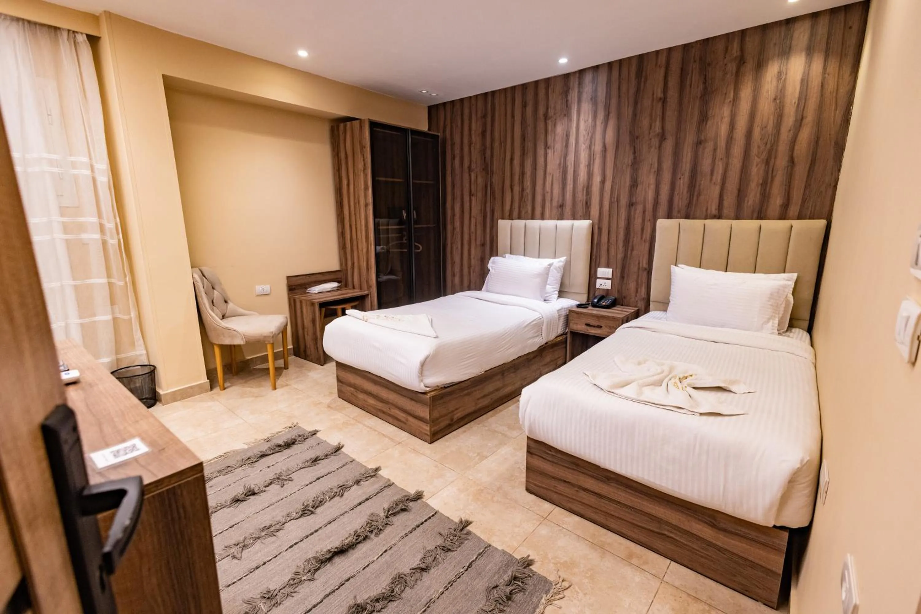 Bed in The Palace Pyramids View Hotel