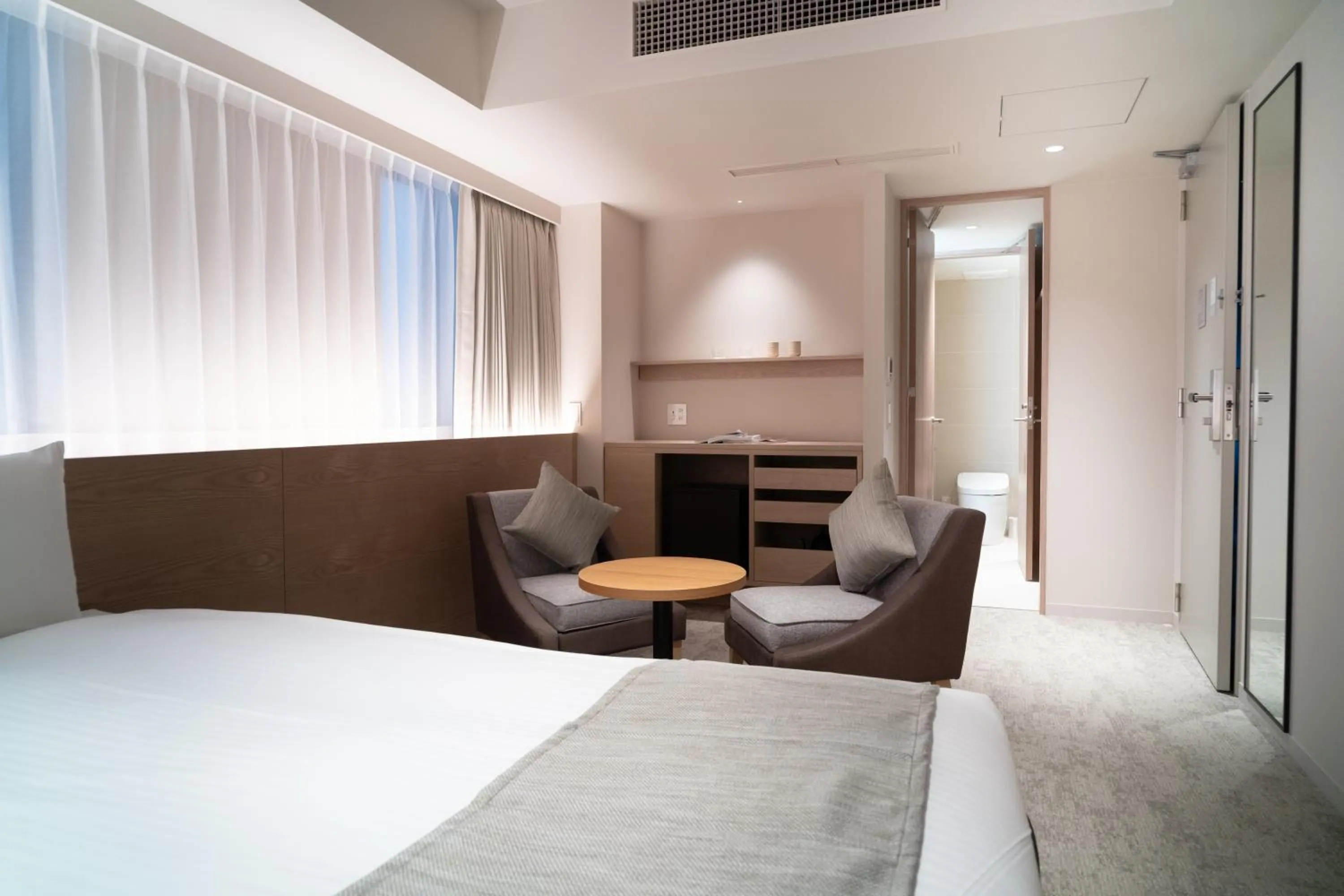 Seating area, Bed in KIORI Collection Shinmachi