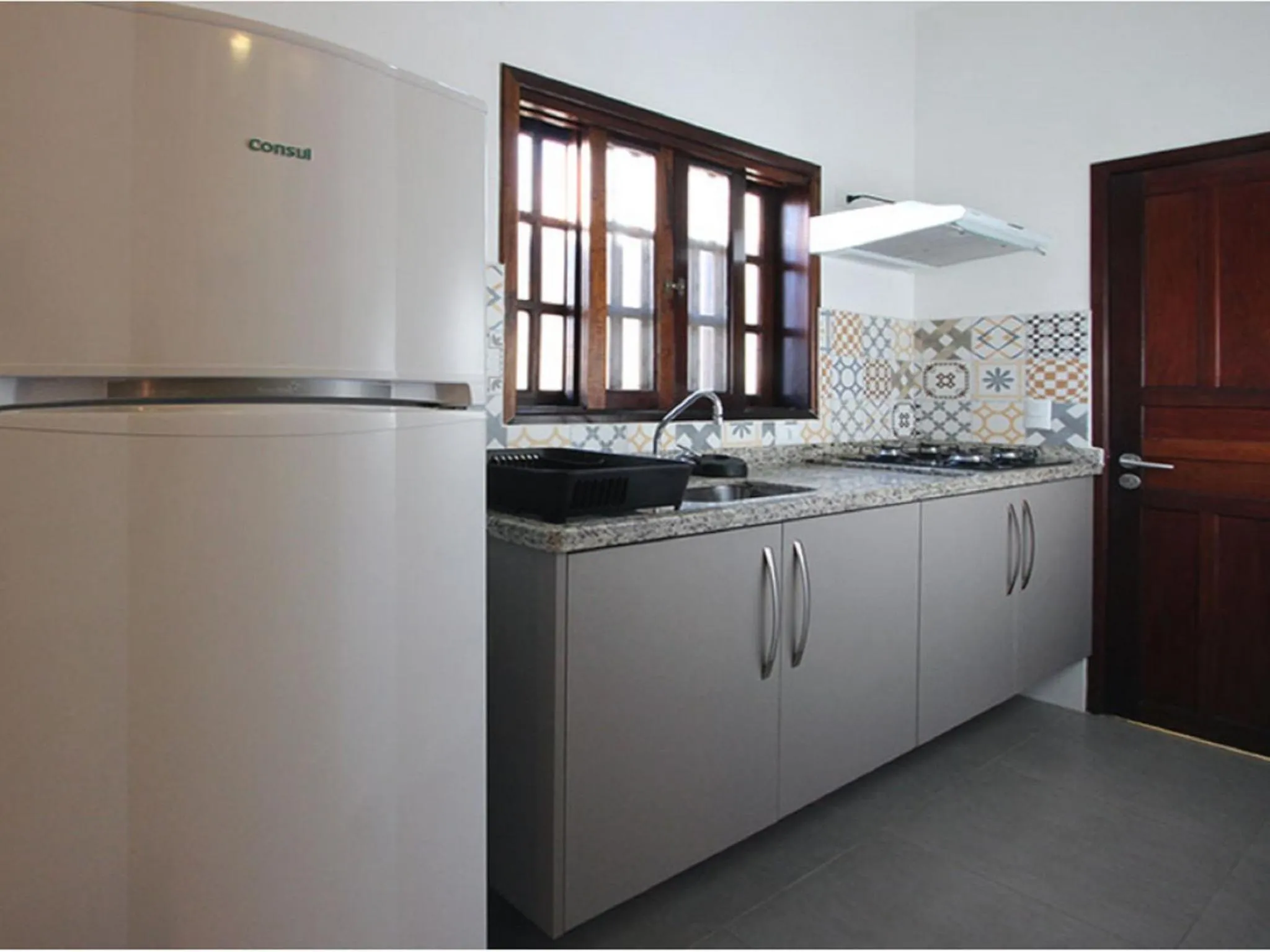Kitchen or kitchenette in Velas Chalés