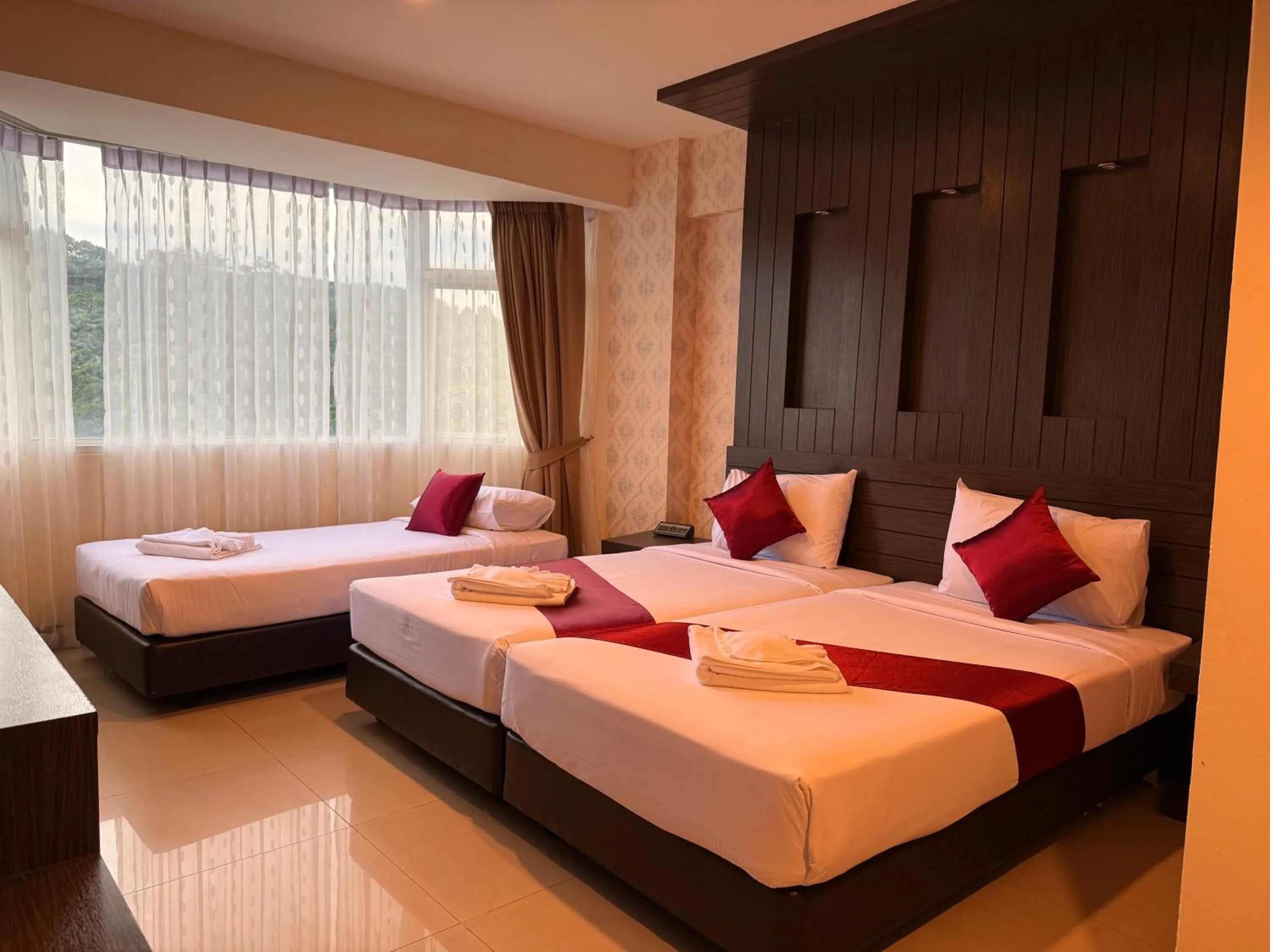 Bed in Suncity Hotel Pattaya