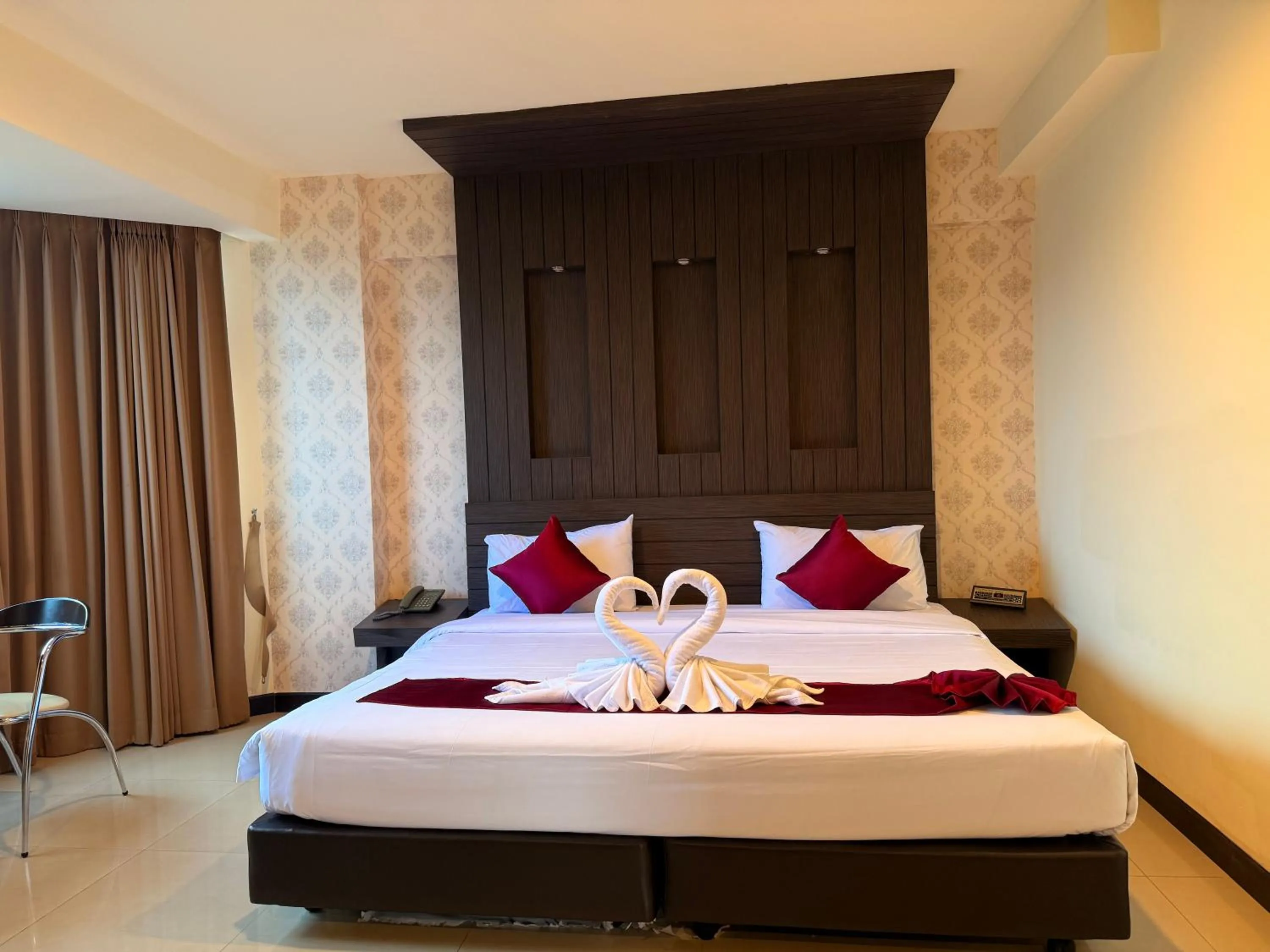 Bed in Suncity Hotel Pattaya