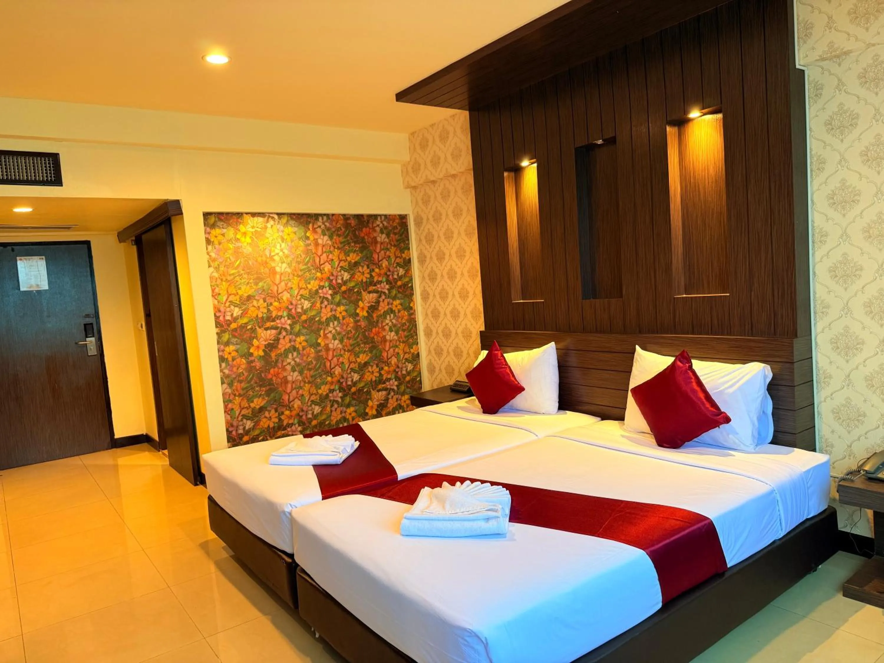 Bed in Suncity Hotel Pattaya