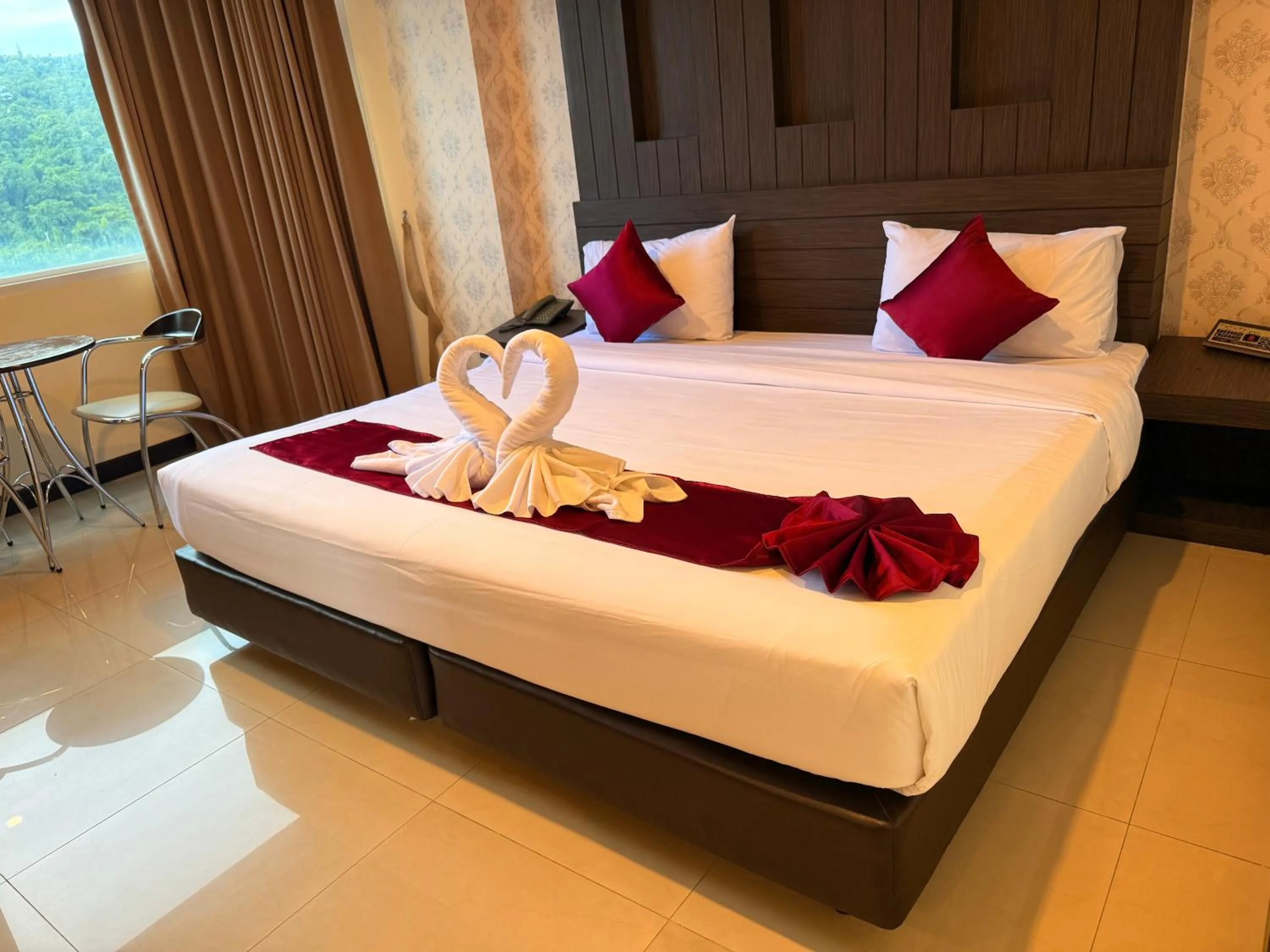 Bed in Suncity Hotel Pattaya