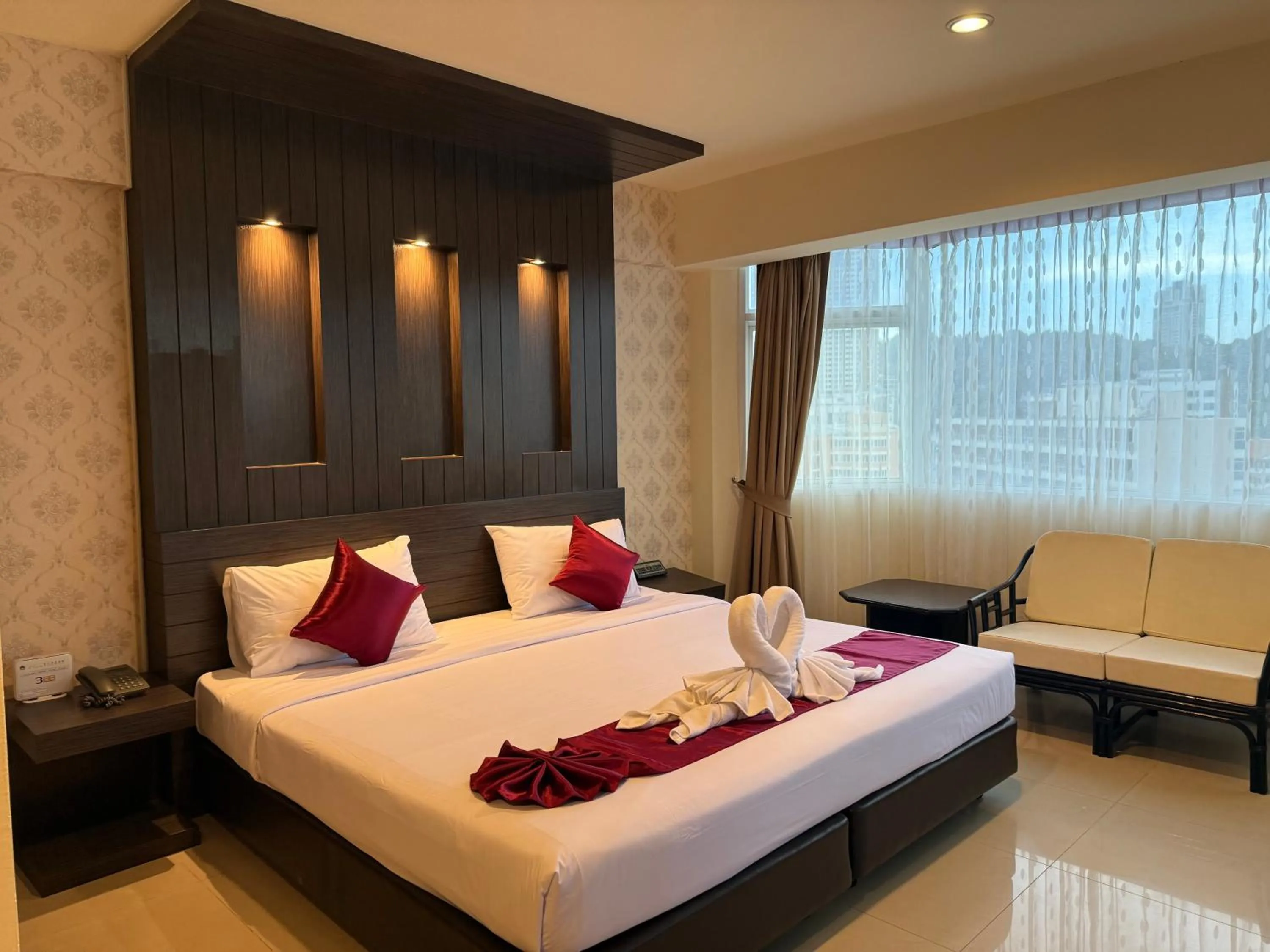Bed in Suncity Hotel Pattaya