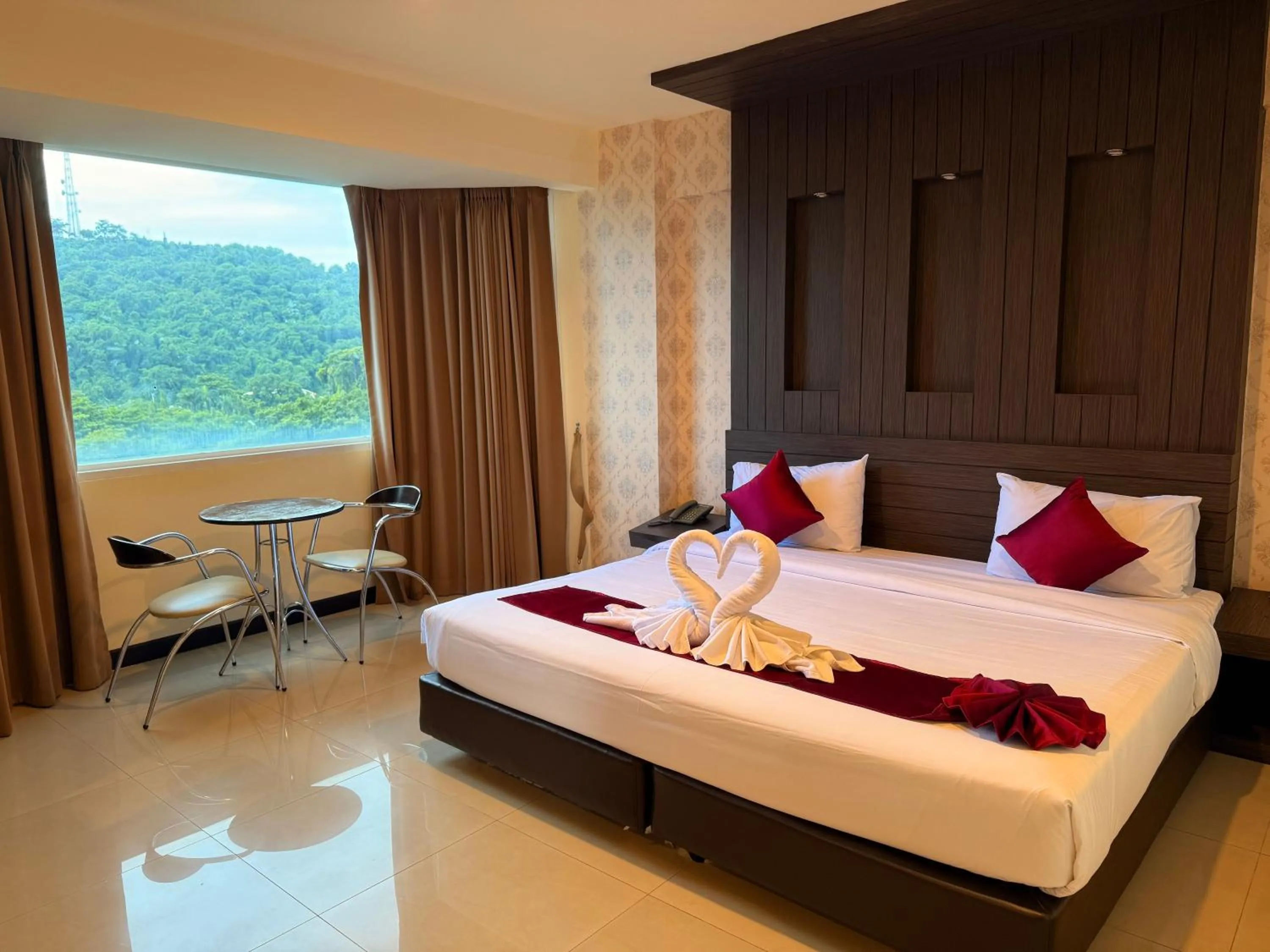Bed in Suncity Hotel Pattaya