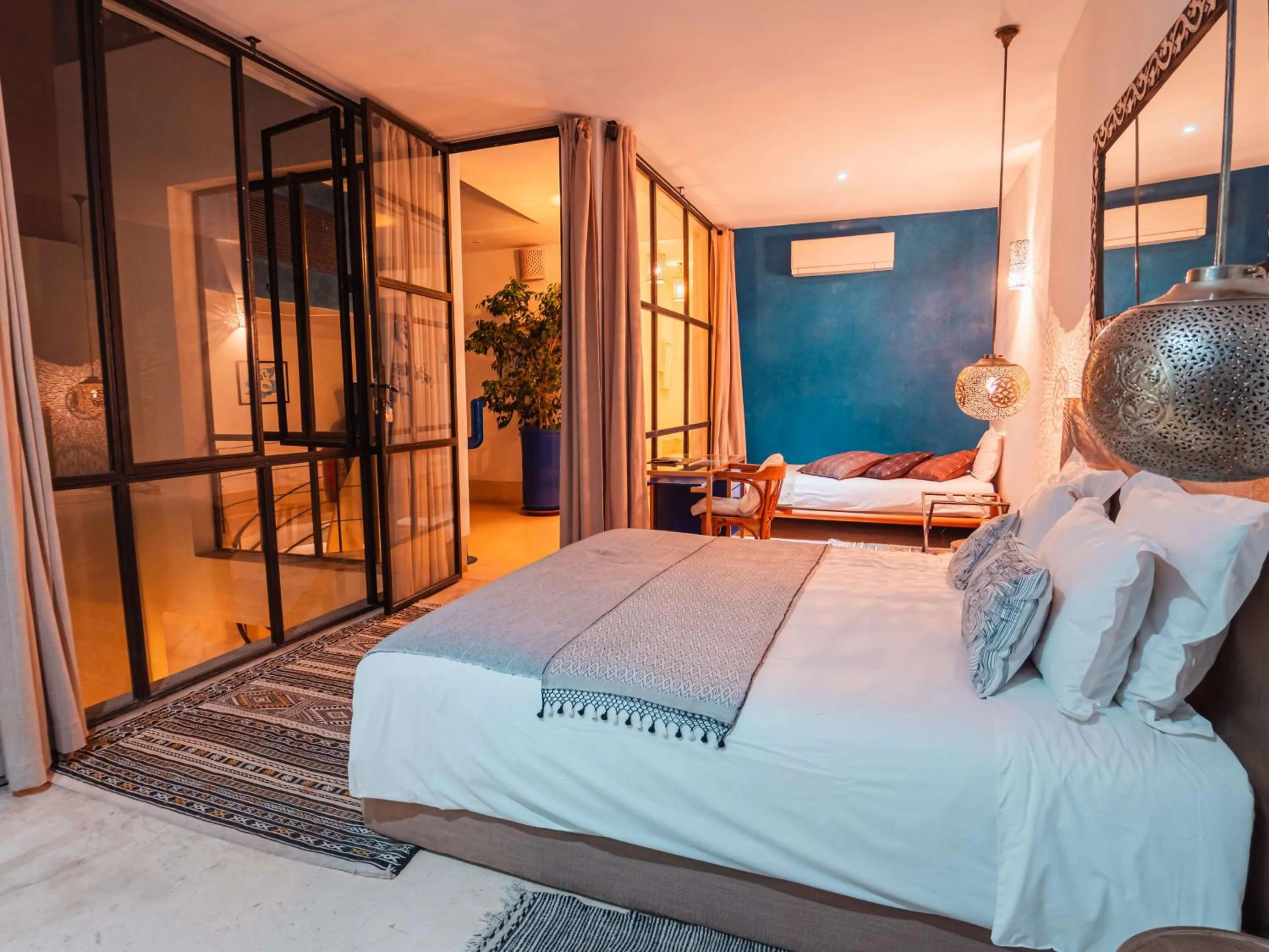 Bed in Riad la Source du Desert