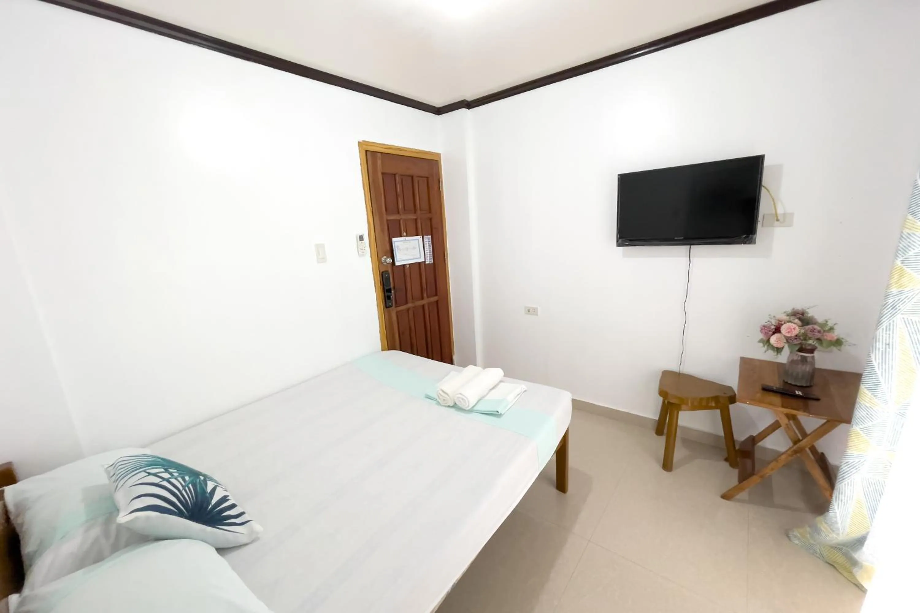 Bed in Catappa Lodge Puerto Galera