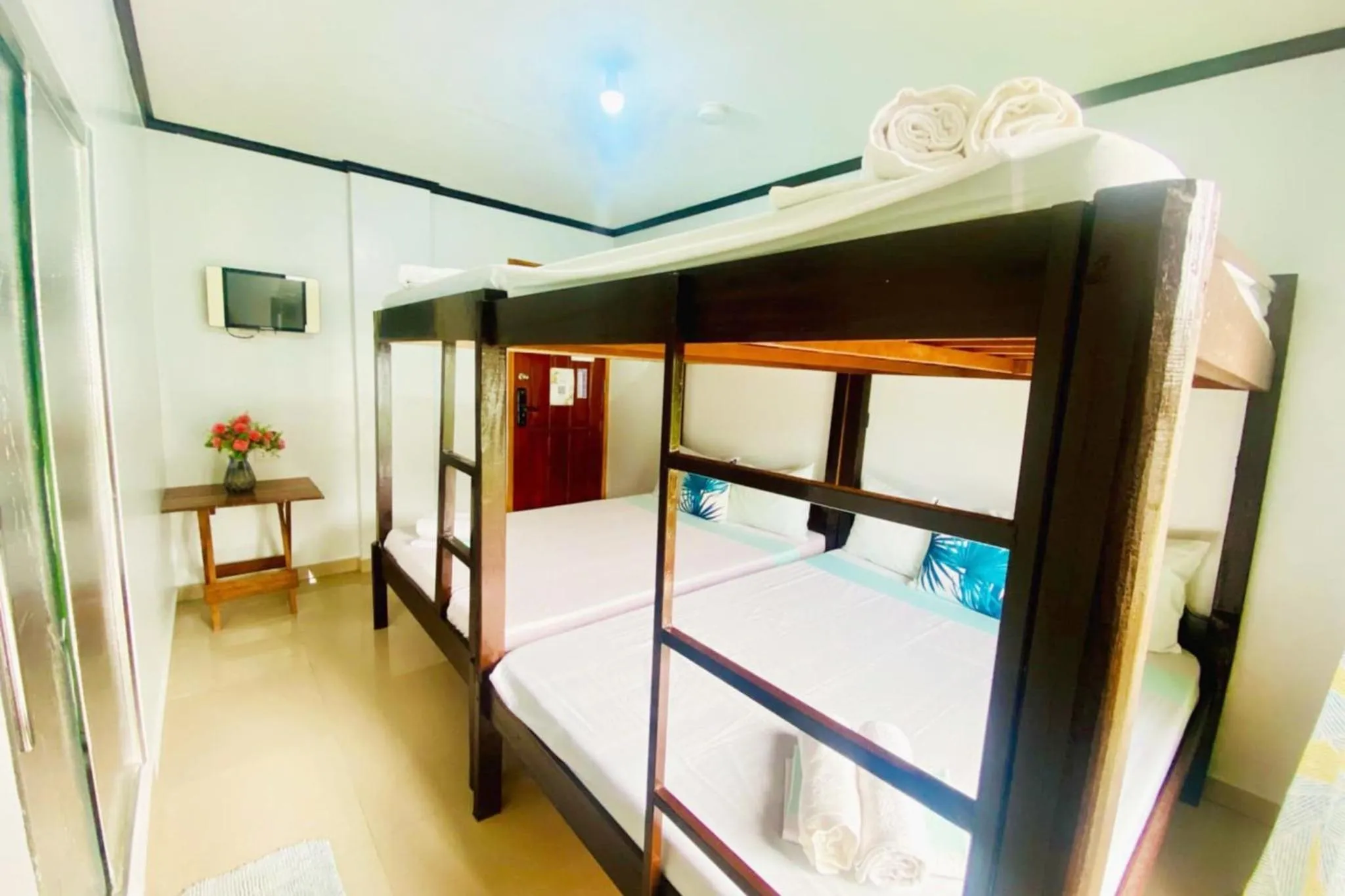 Bed in Catappa Lodge Puerto Galera