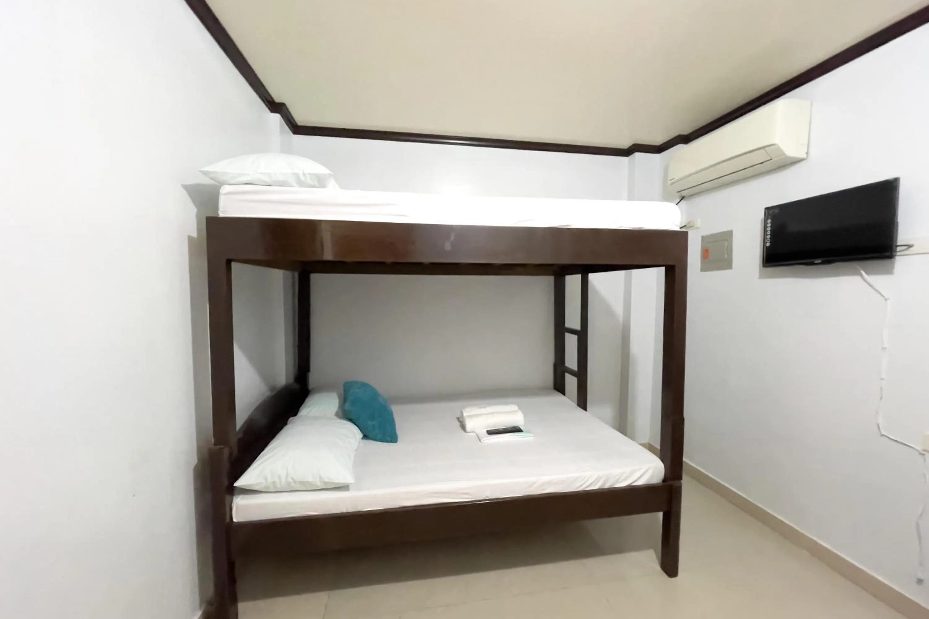 Bed in Catappa Lodge Puerto Galera