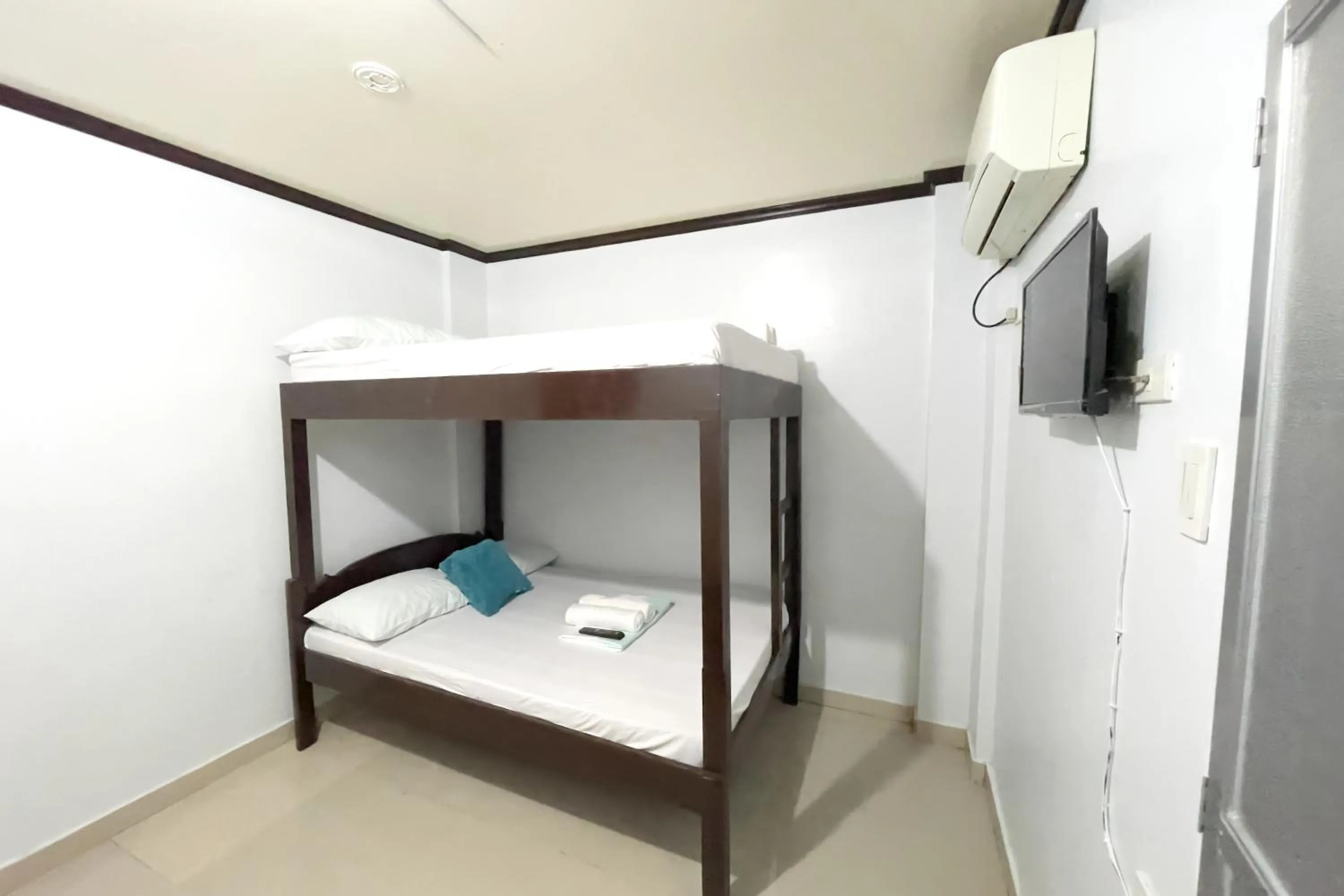 Bed in Catappa Lodge Puerto Galera