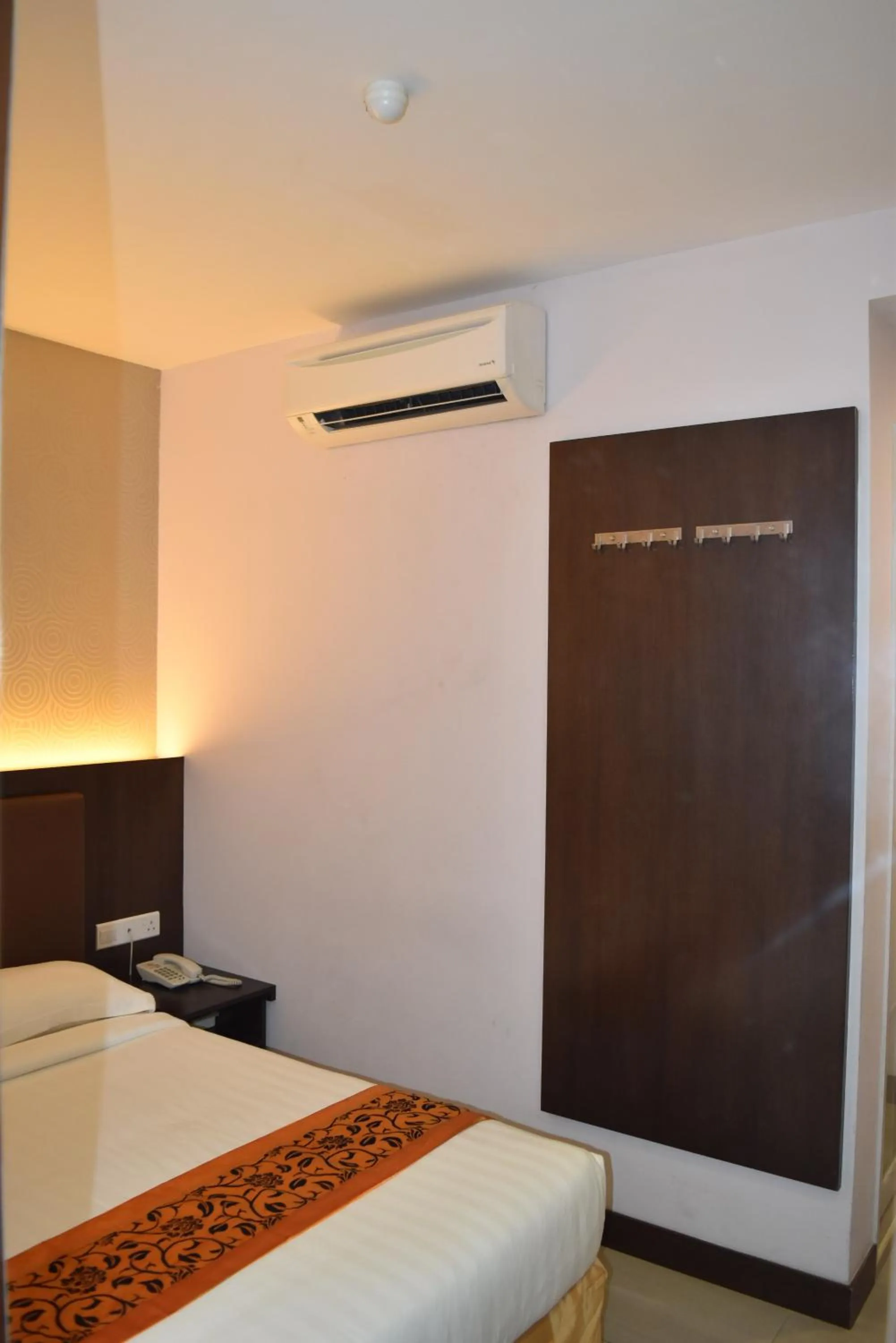 Bed in Sunrise Hotel