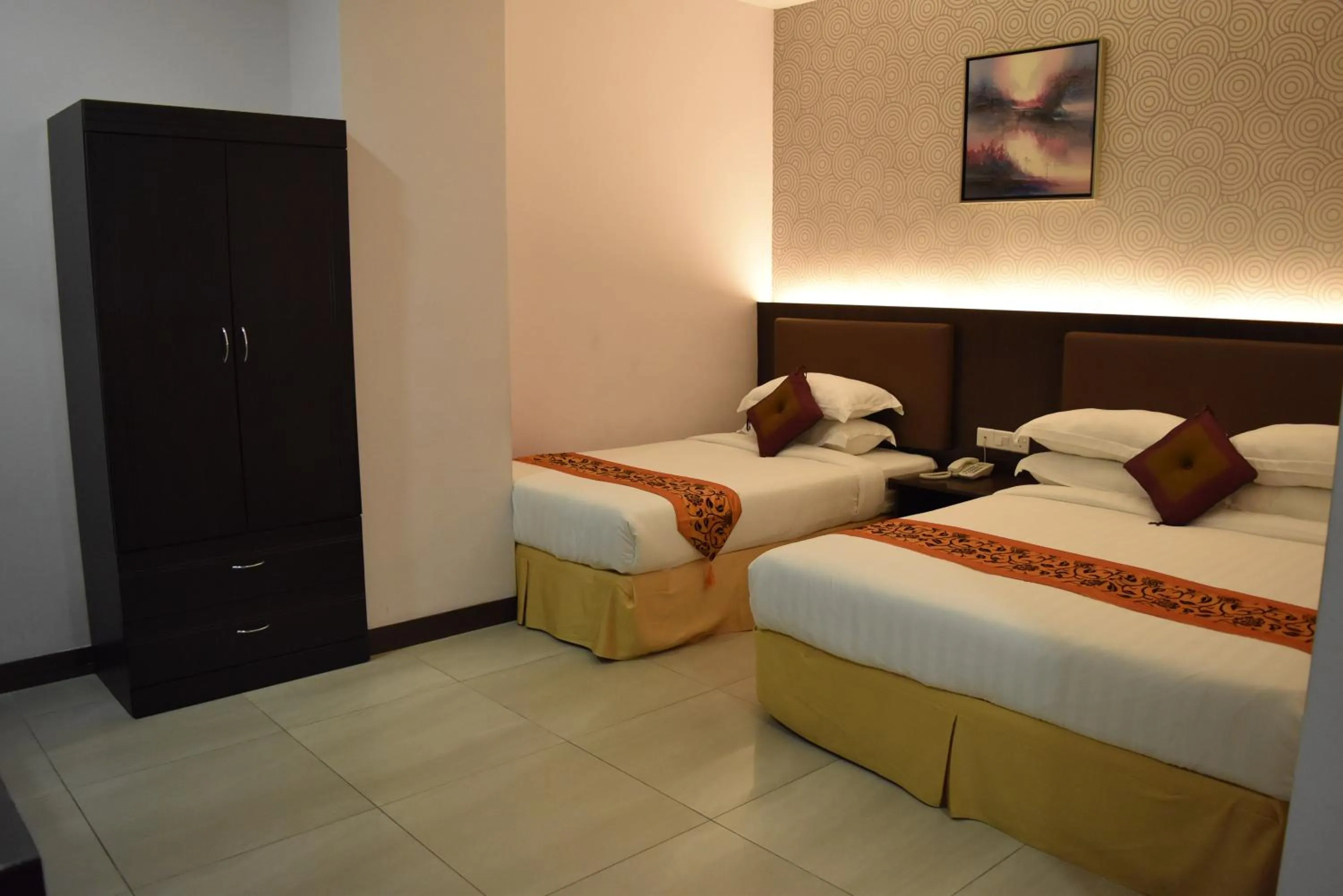 Bed in Sunrise Hotel