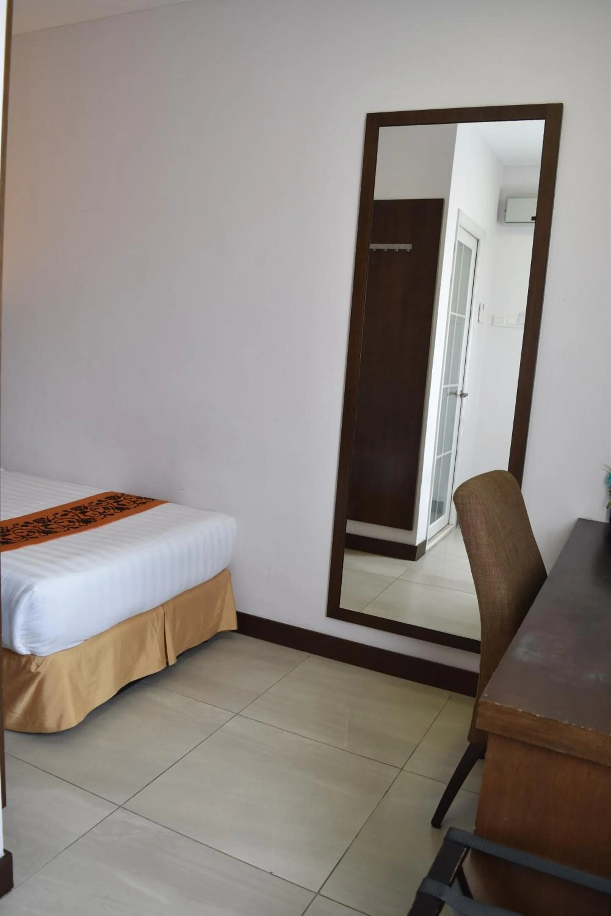 Bed in Sunrise Hotel