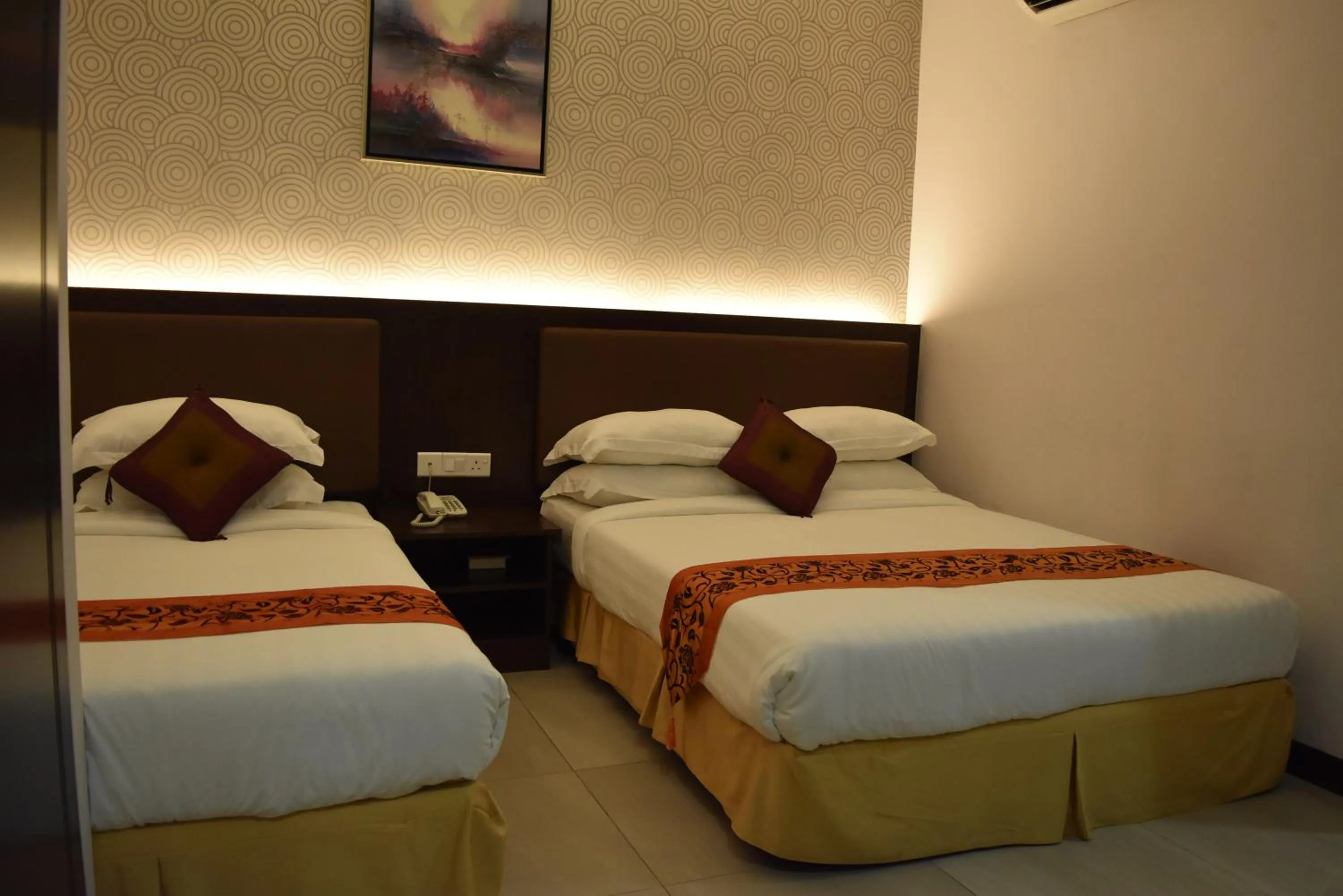 Bed in Sunrise Hotel