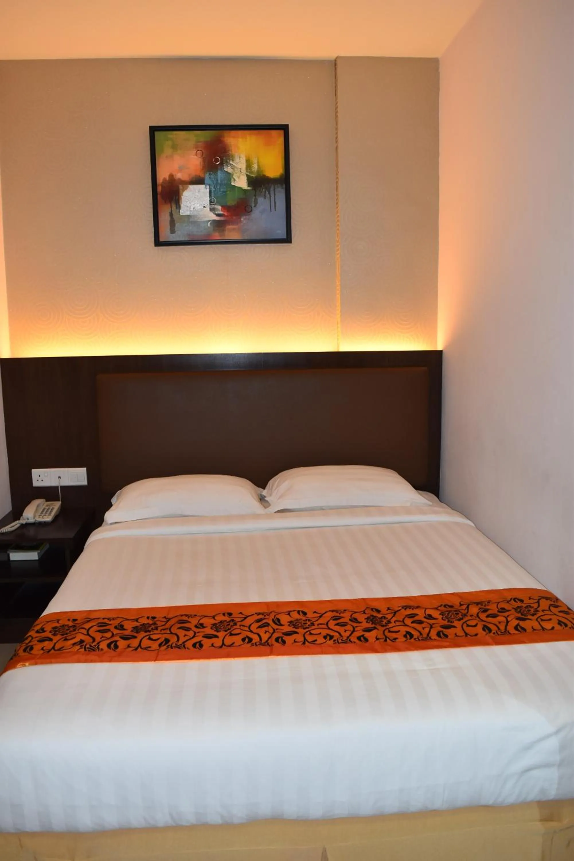Bed in Sunrise Hotel