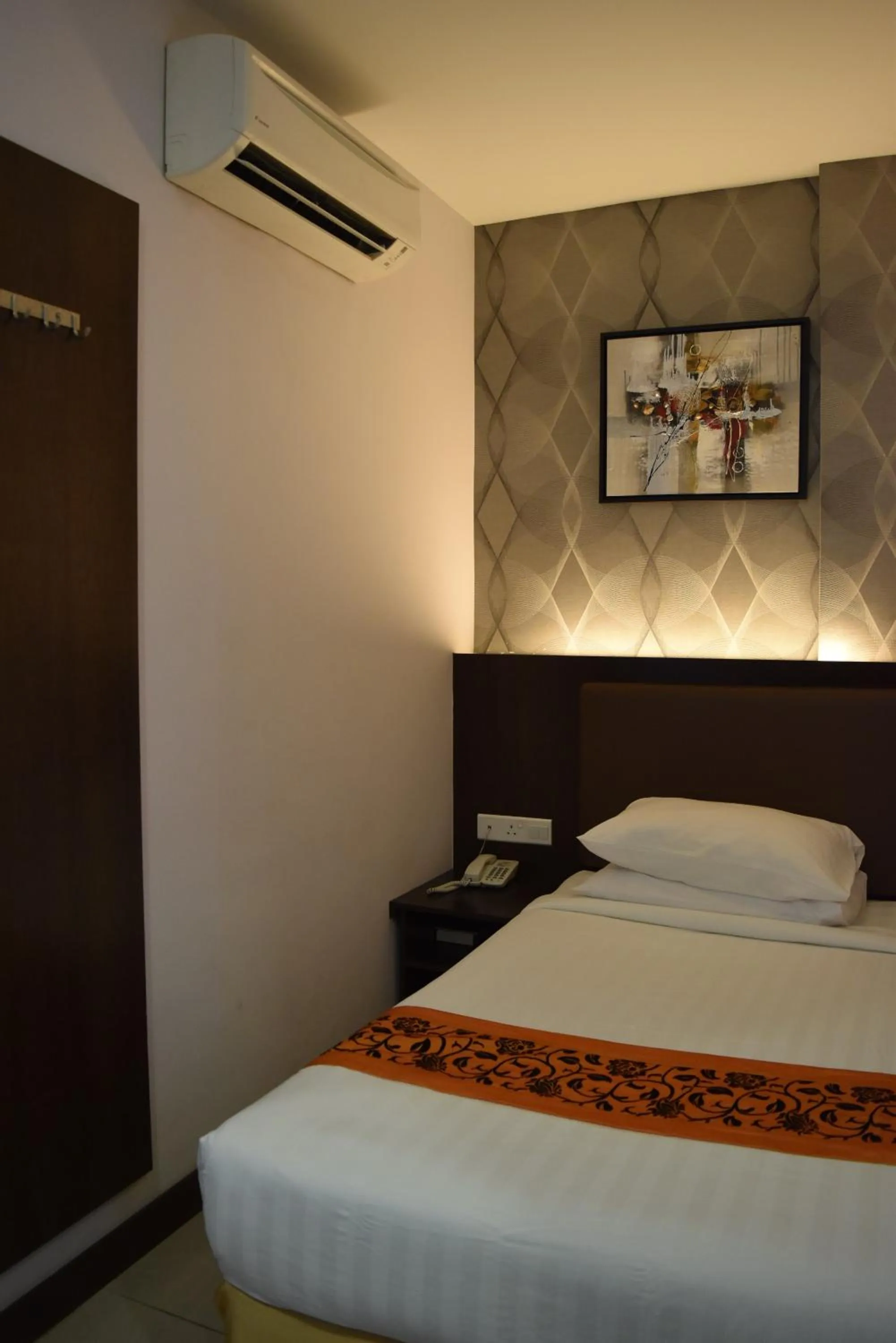 Bed in Sunrise Hotel