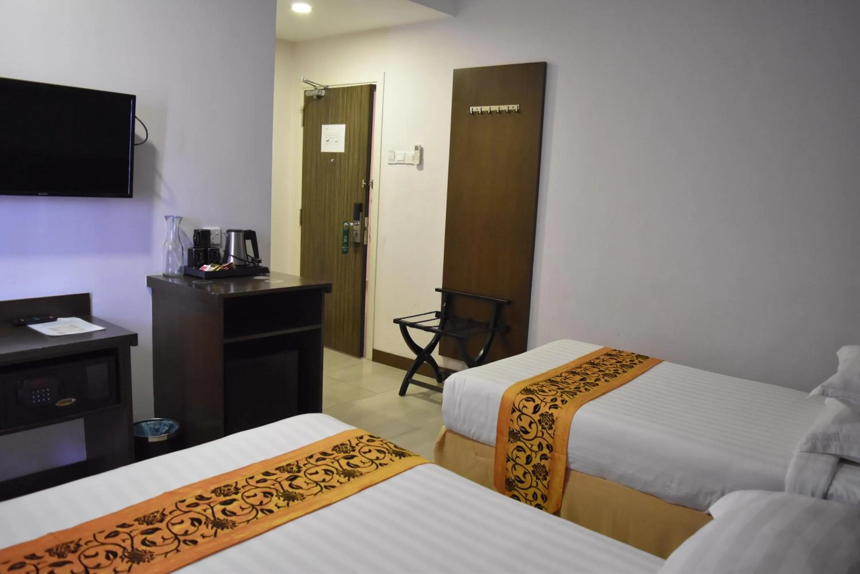 Bed in Sunrise Hotel