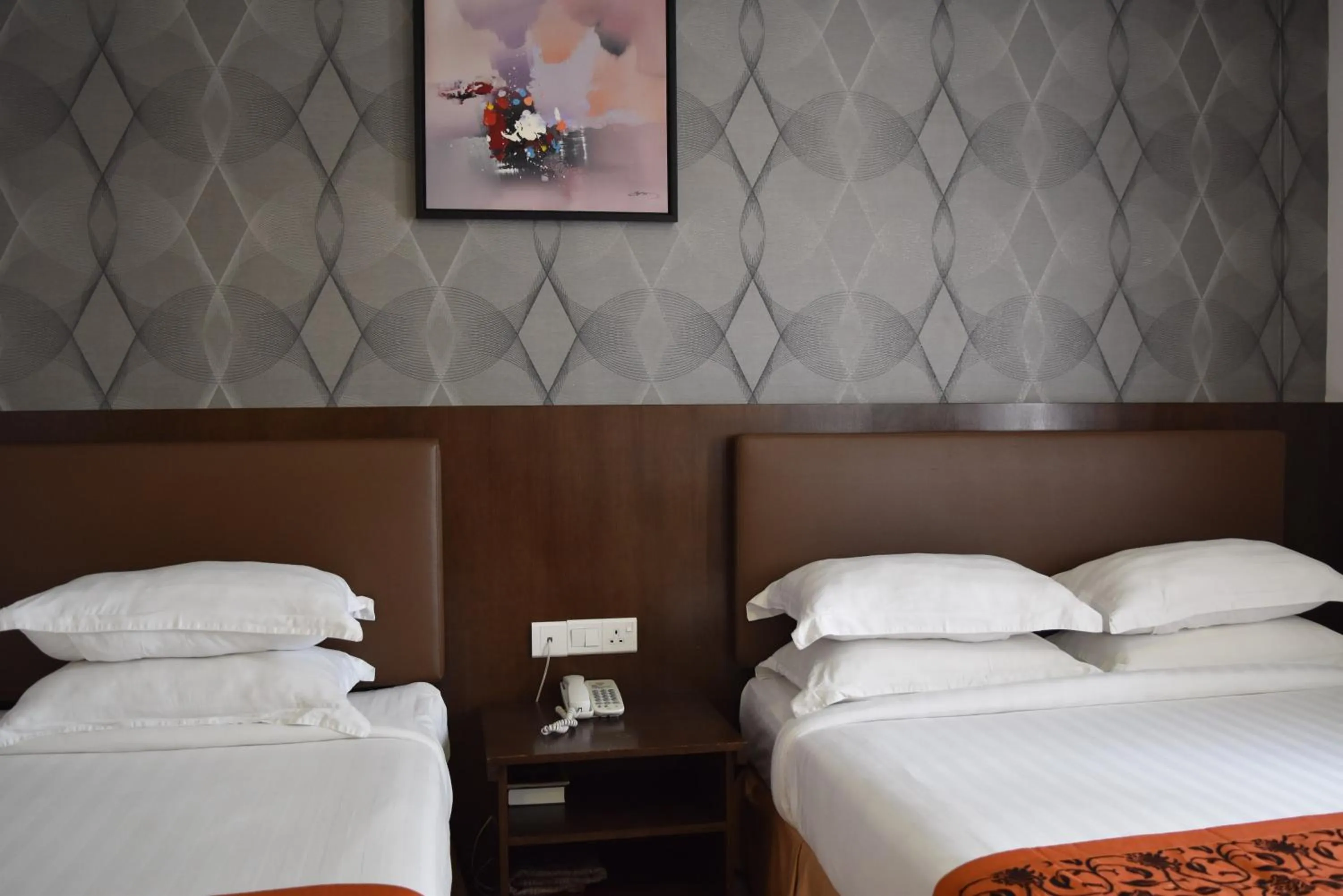 Bed in Sunrise Hotel