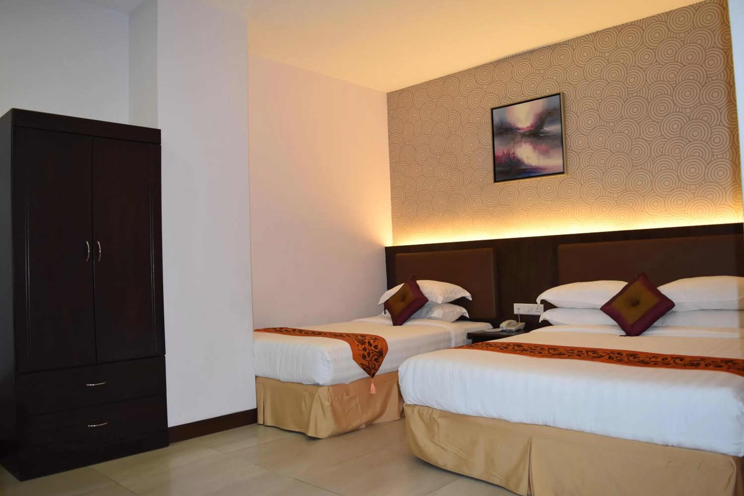 Bed in Sunrise Hotel