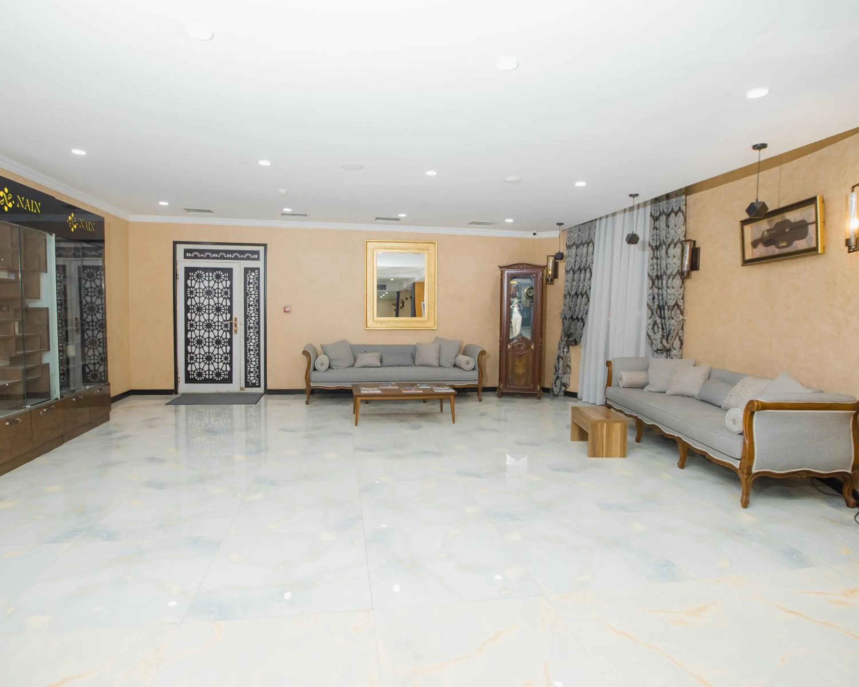 Living room in Corniche White City Hotel