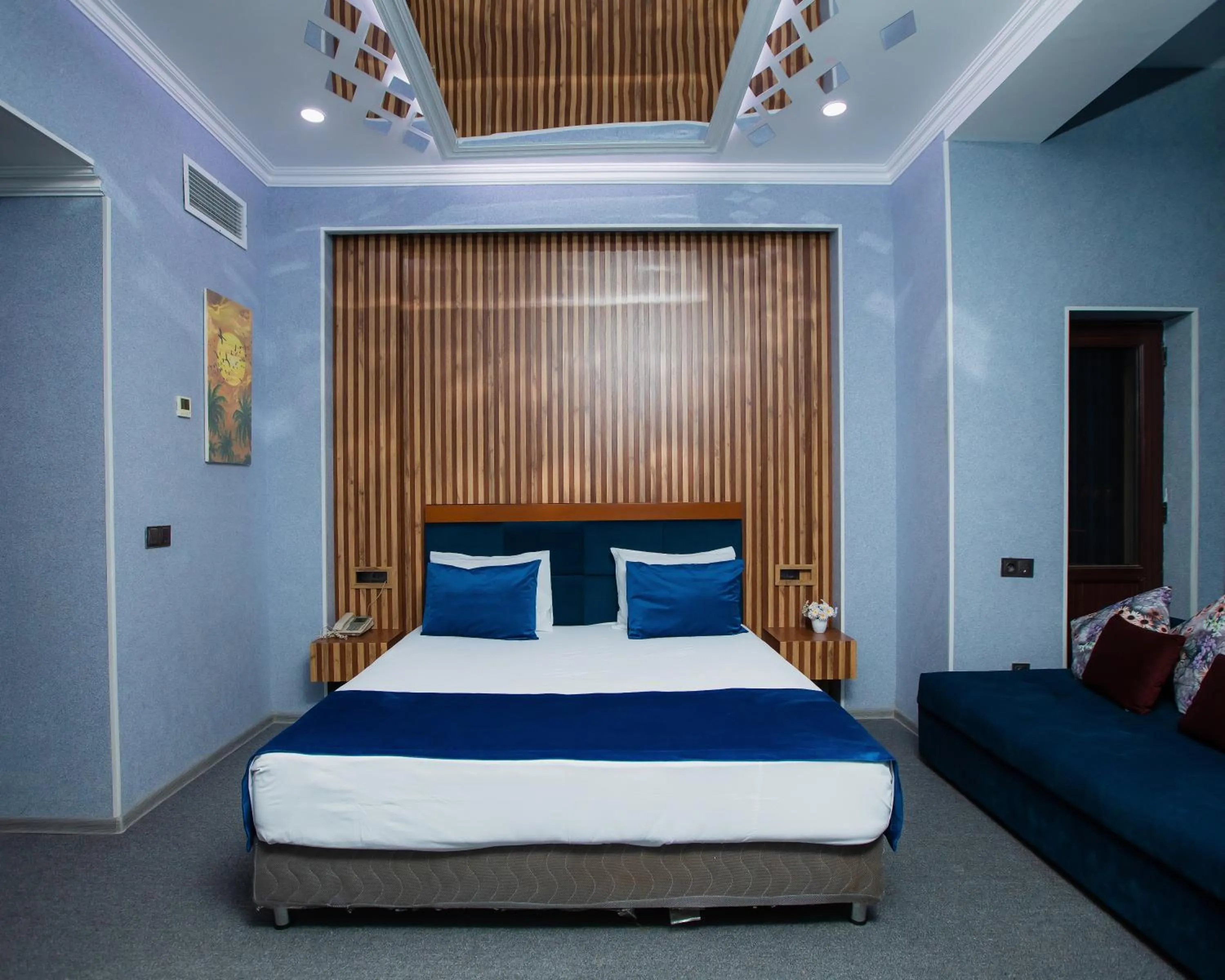 Bed in Corniche White City Hotel