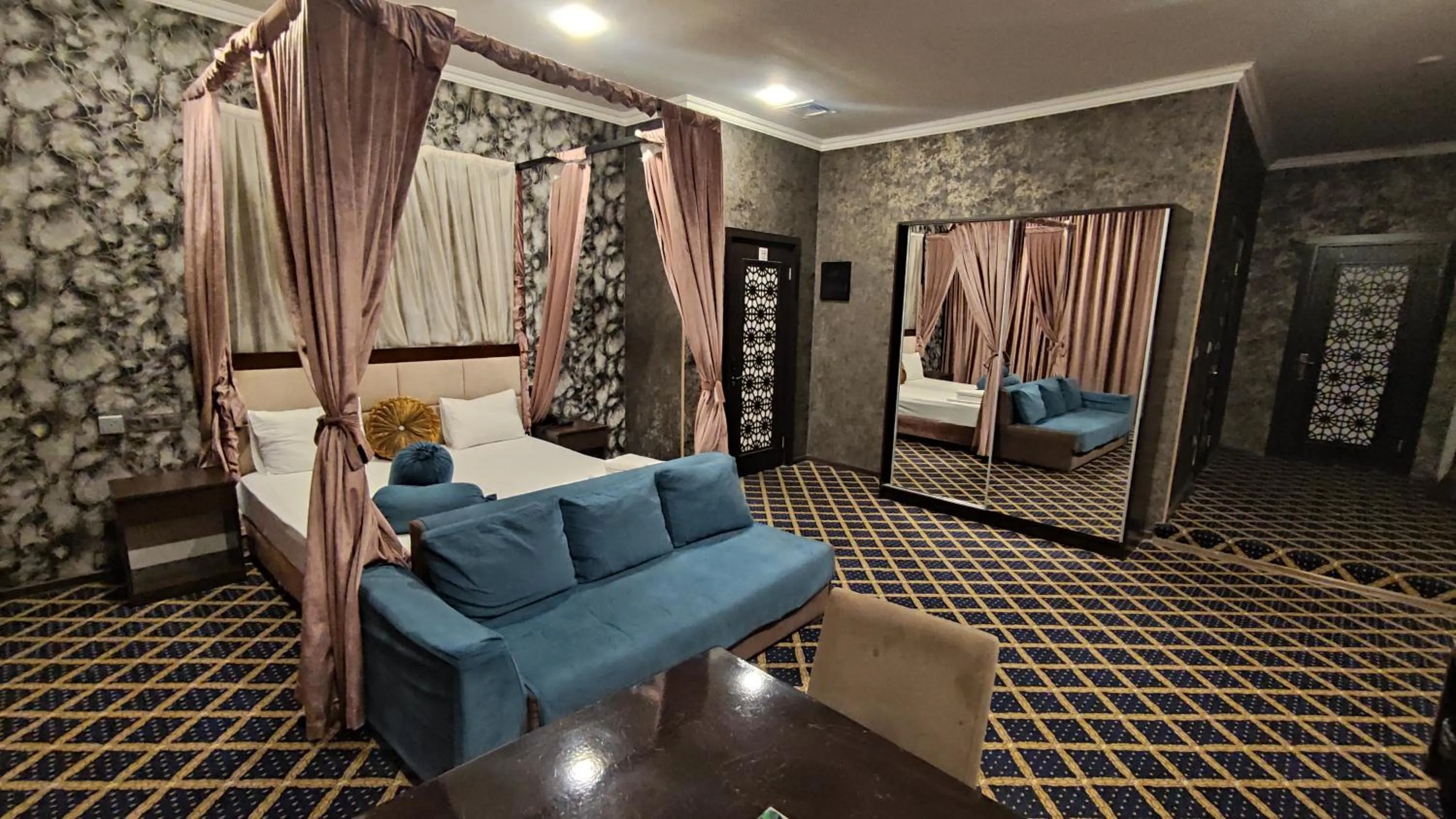 Bed in Corniche White City Hotel