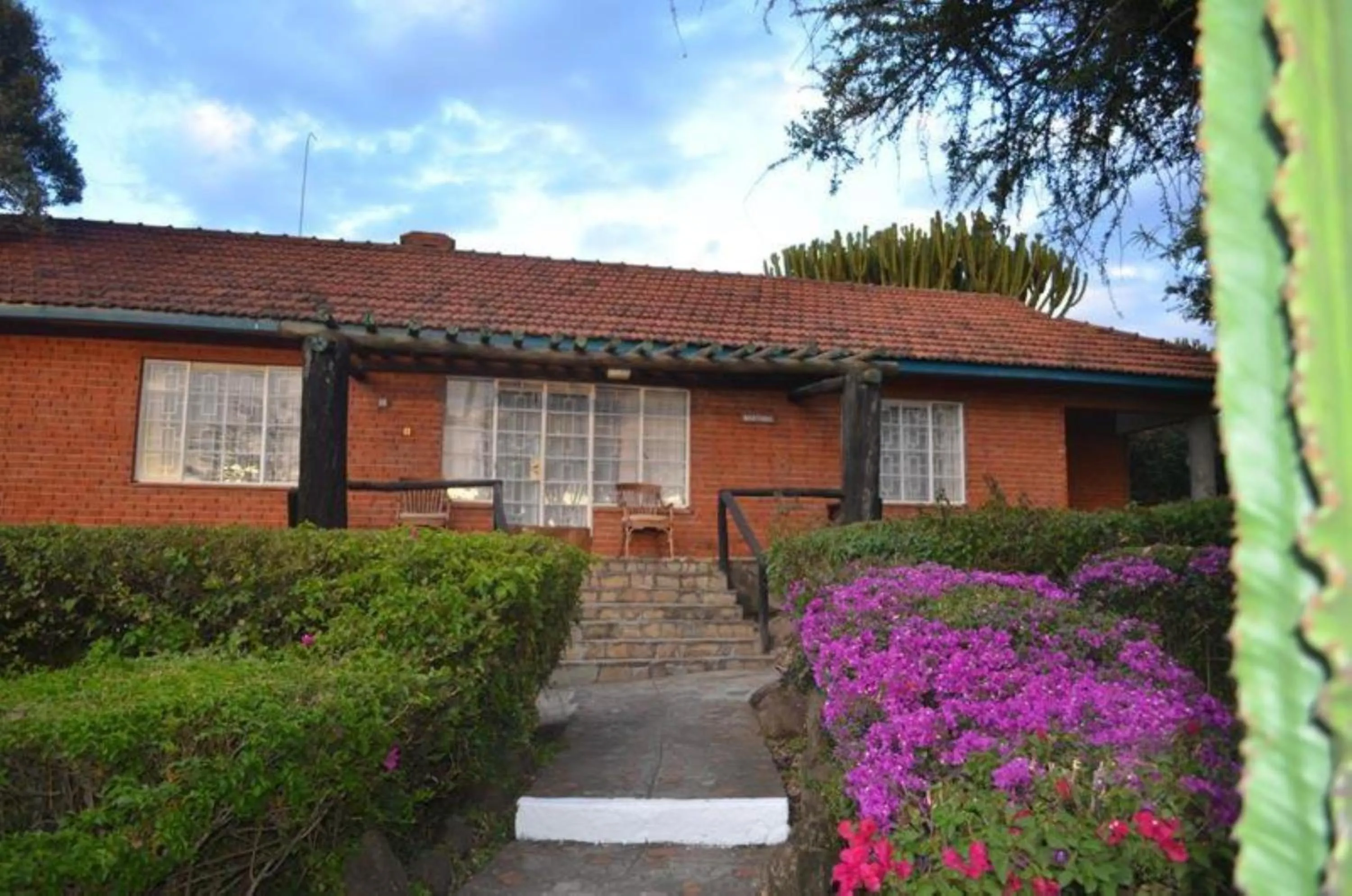 Property building in Jacaranda Lake Elementaita Lodge