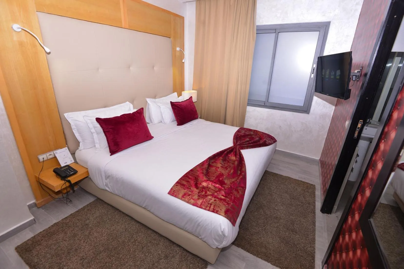 Bed in Le 135 appart hotel