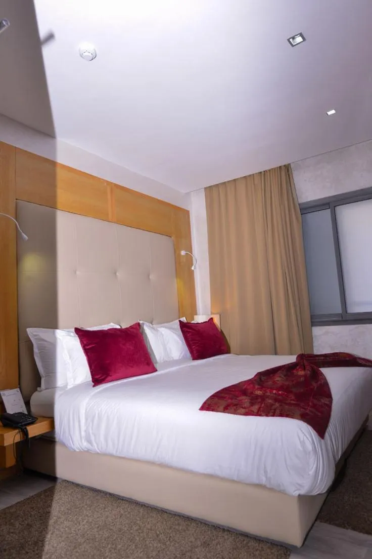 Bed in Le 135 appart hotel