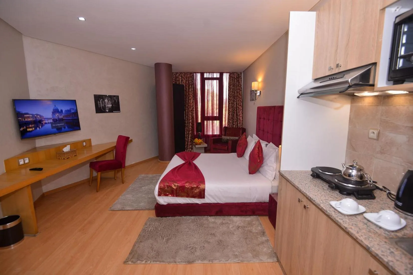 Bed in Le 135 appart hotel