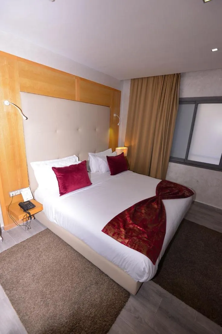 Bed in Le 135 appart hotel