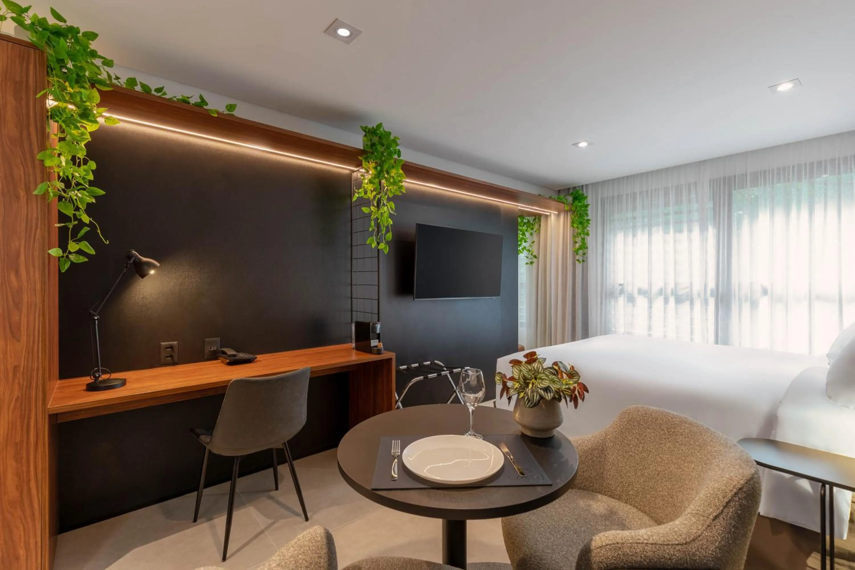 Communal lounge/ TV room in Cozzy Premium Paulista Hotel