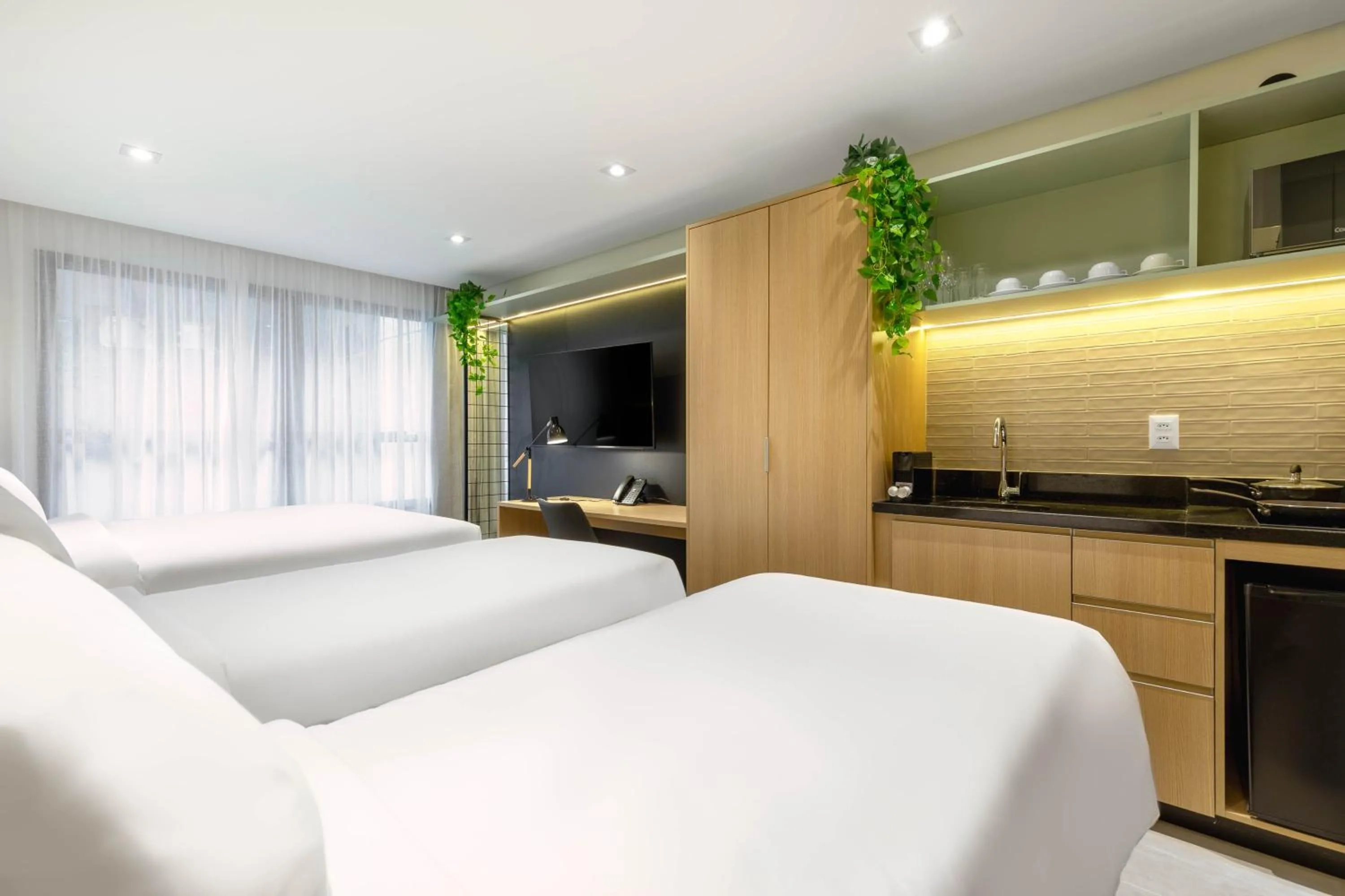 TV and multimedia in Cozzy Premium Paulista Hotel