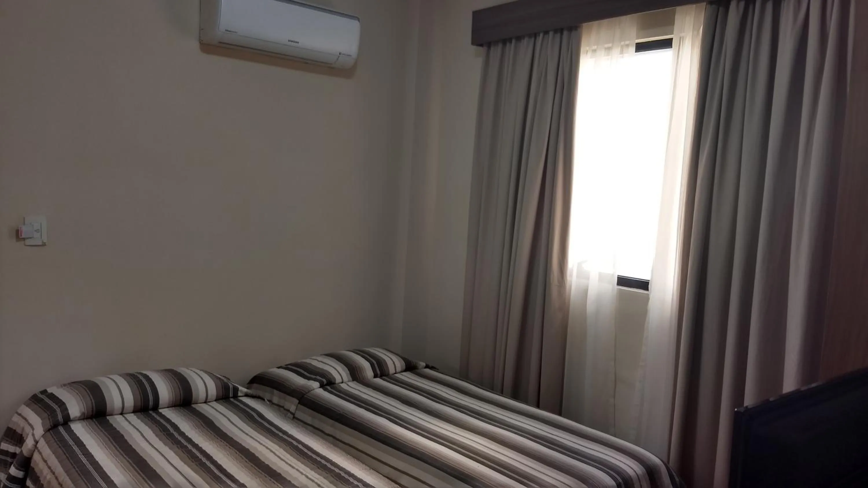 Bed in Castel Plaza Hotel