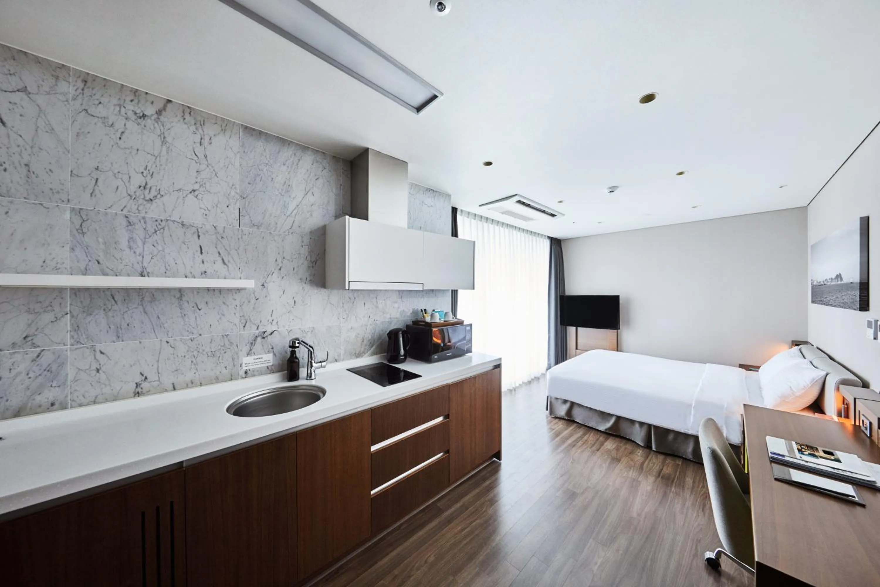 Bed in Felix by STX Hotel & Suite