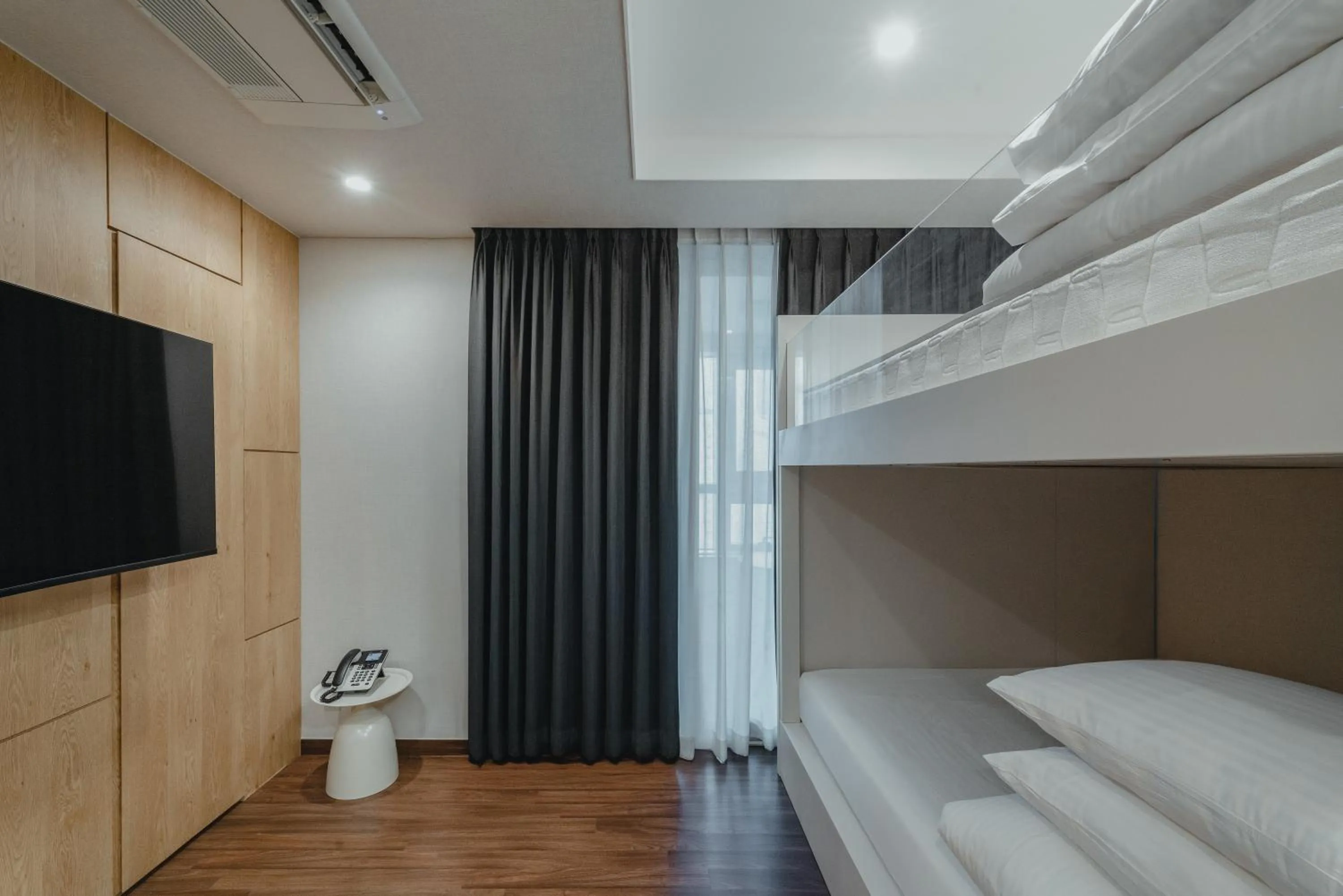 Bed in Felix by STX Hotel & Suite