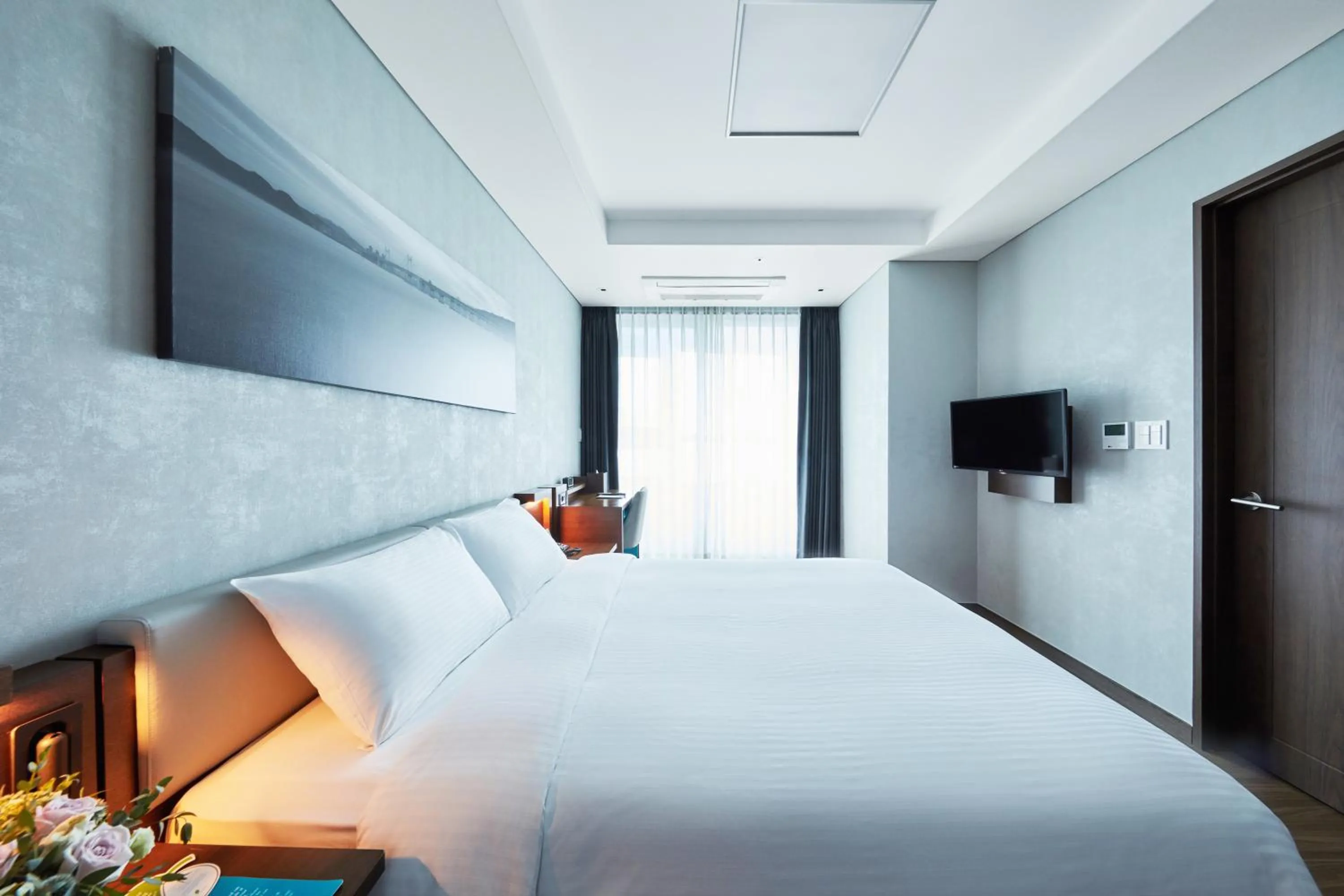 Bed in Felix by STX Hotel & Suite