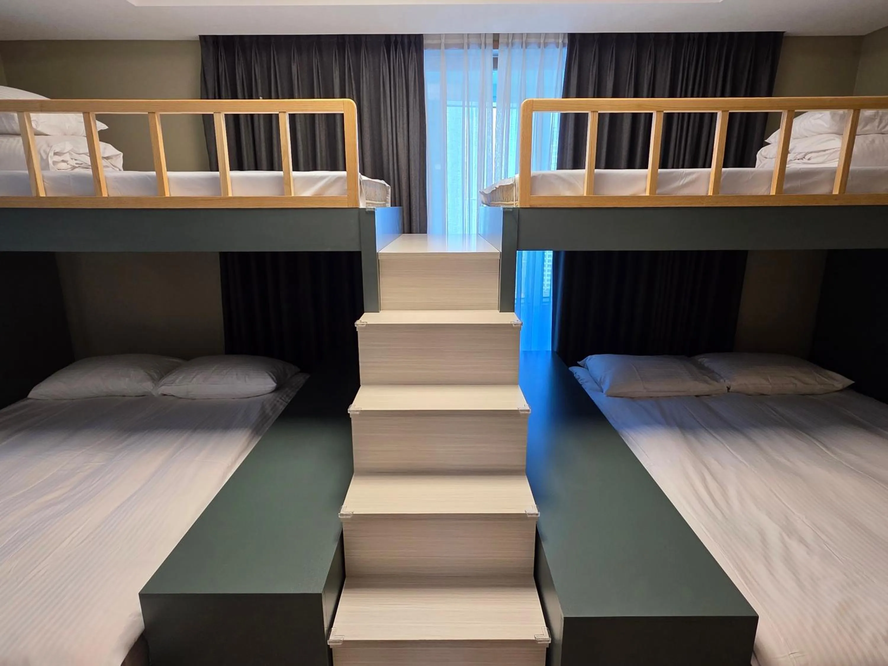 Bed in Felix by STX Hotel & Suite