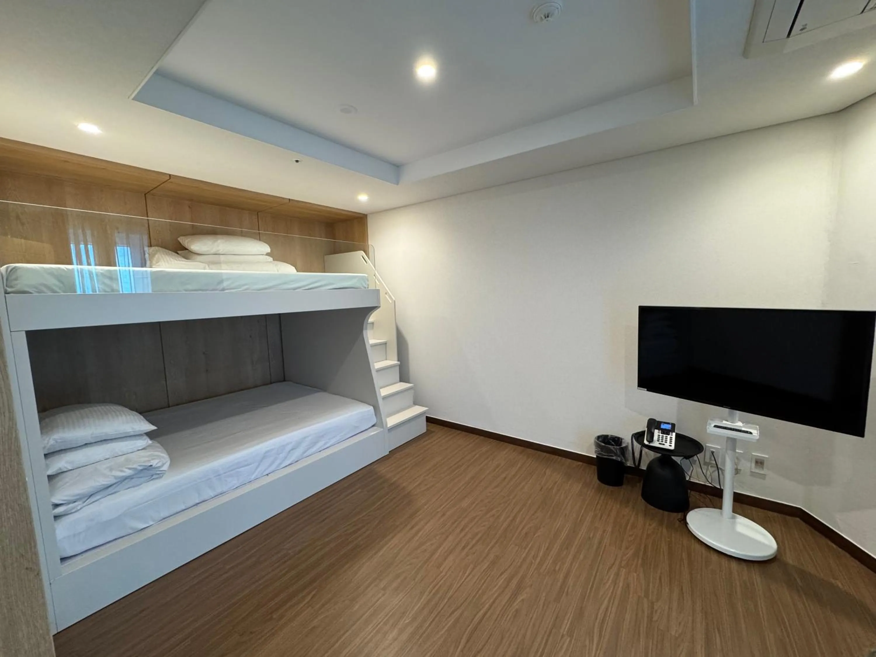 Bed in Felix by STX Hotel & Suite