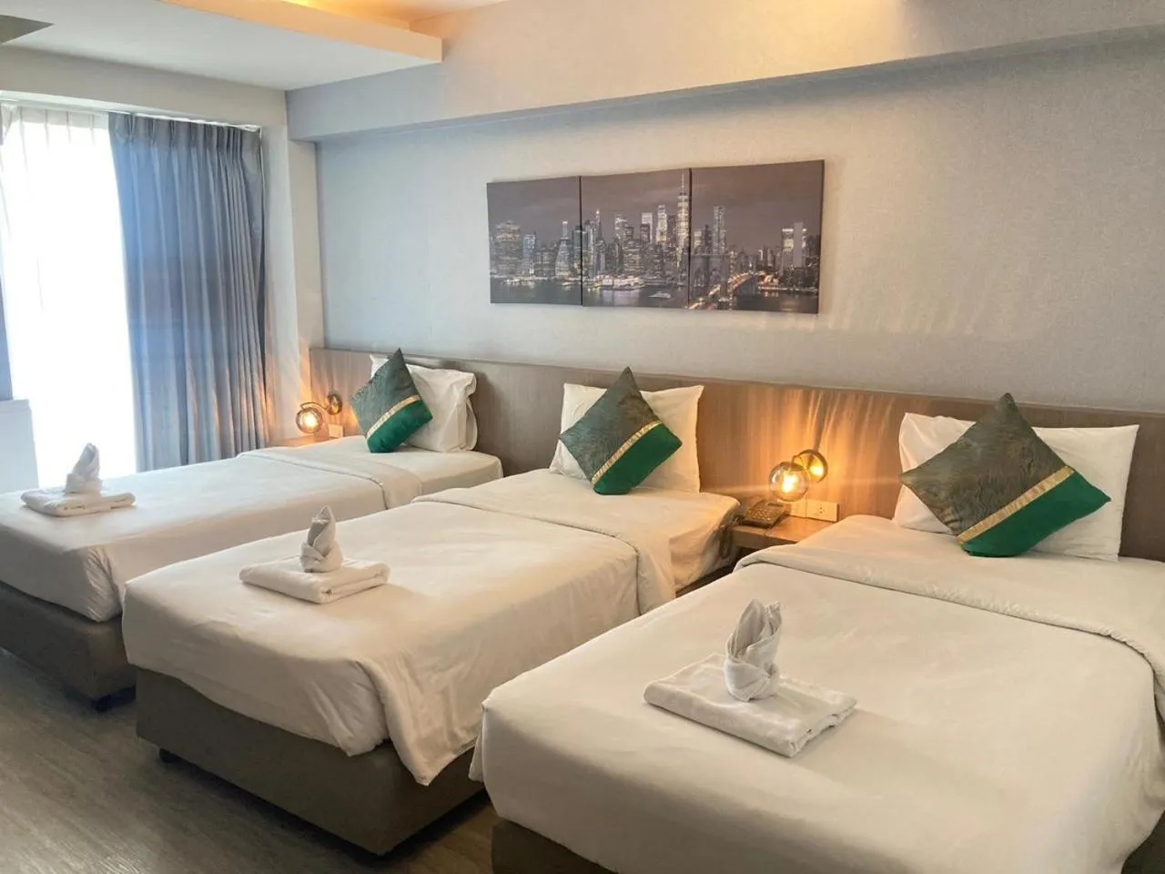 Bed in KANN Pattaya Hotel