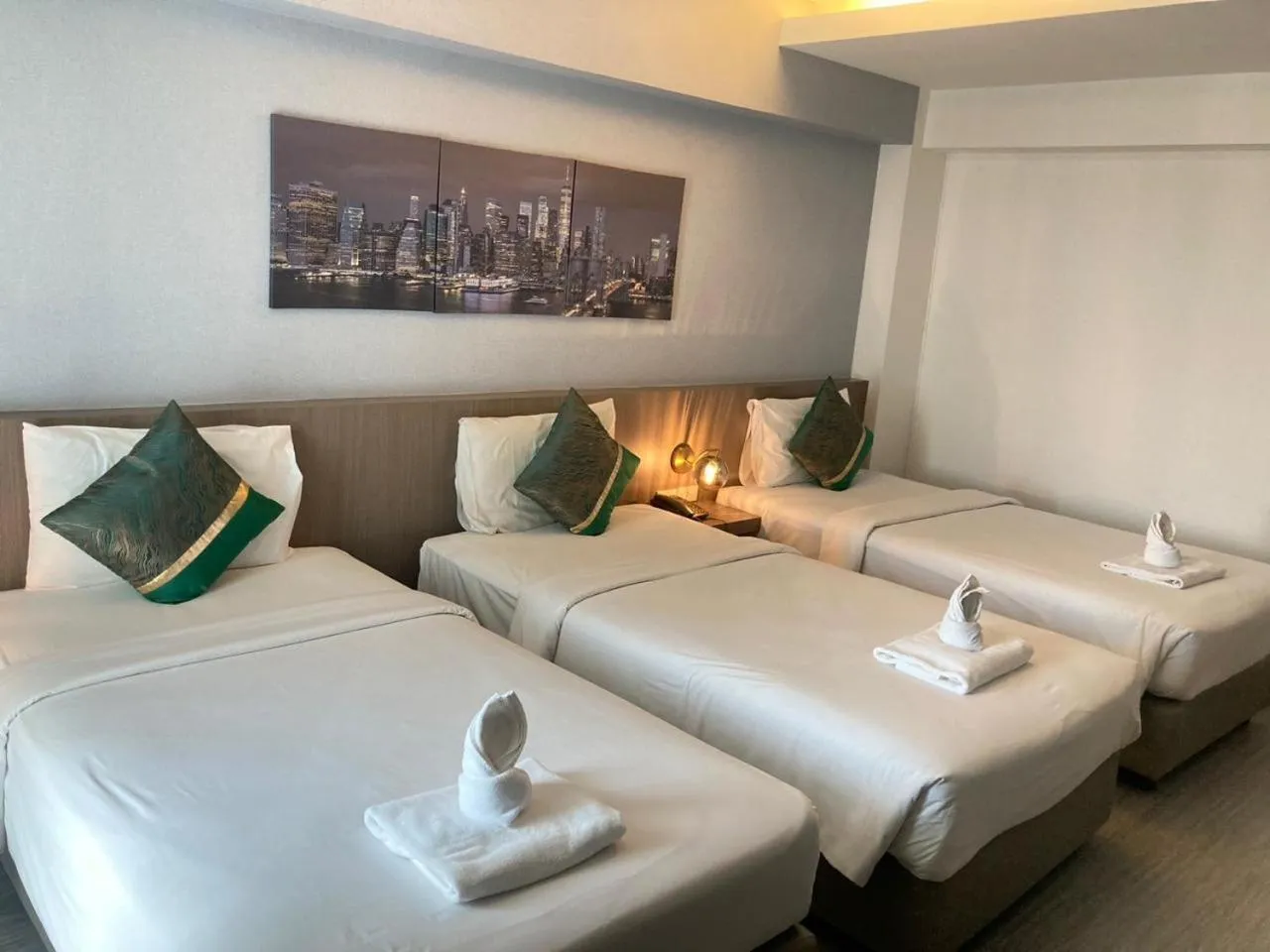 Bed in KANN Pattaya Hotel