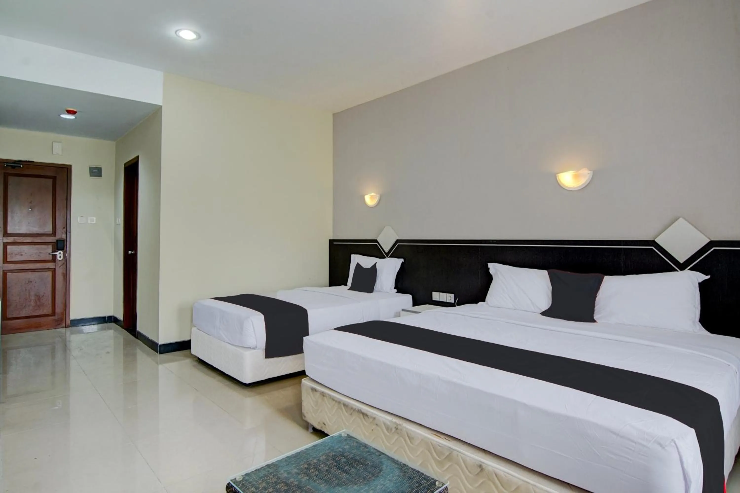Bedroom, Bed in Townhouse Oak Pekanbaru near Mall Pekanbaru formerly Hotel Grand Sahara