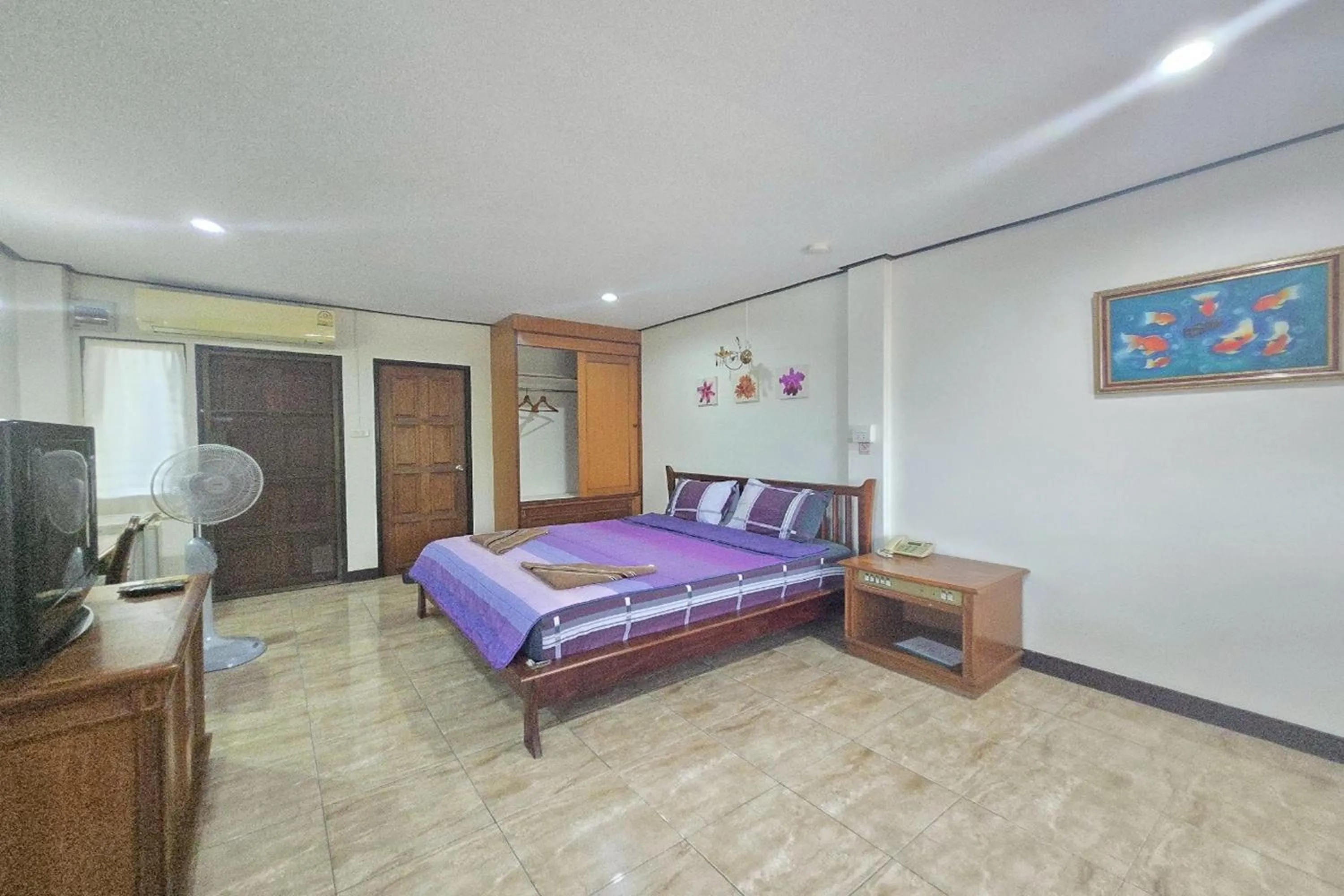 Bed in Phaiboon Hotel & Resort