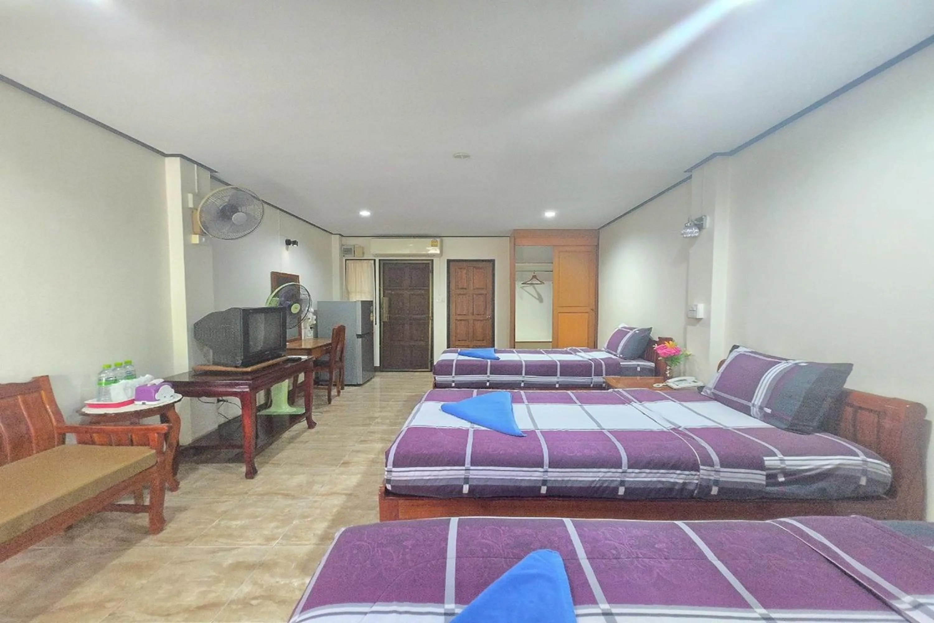 Bed in Phaiboon Hotel & Resort