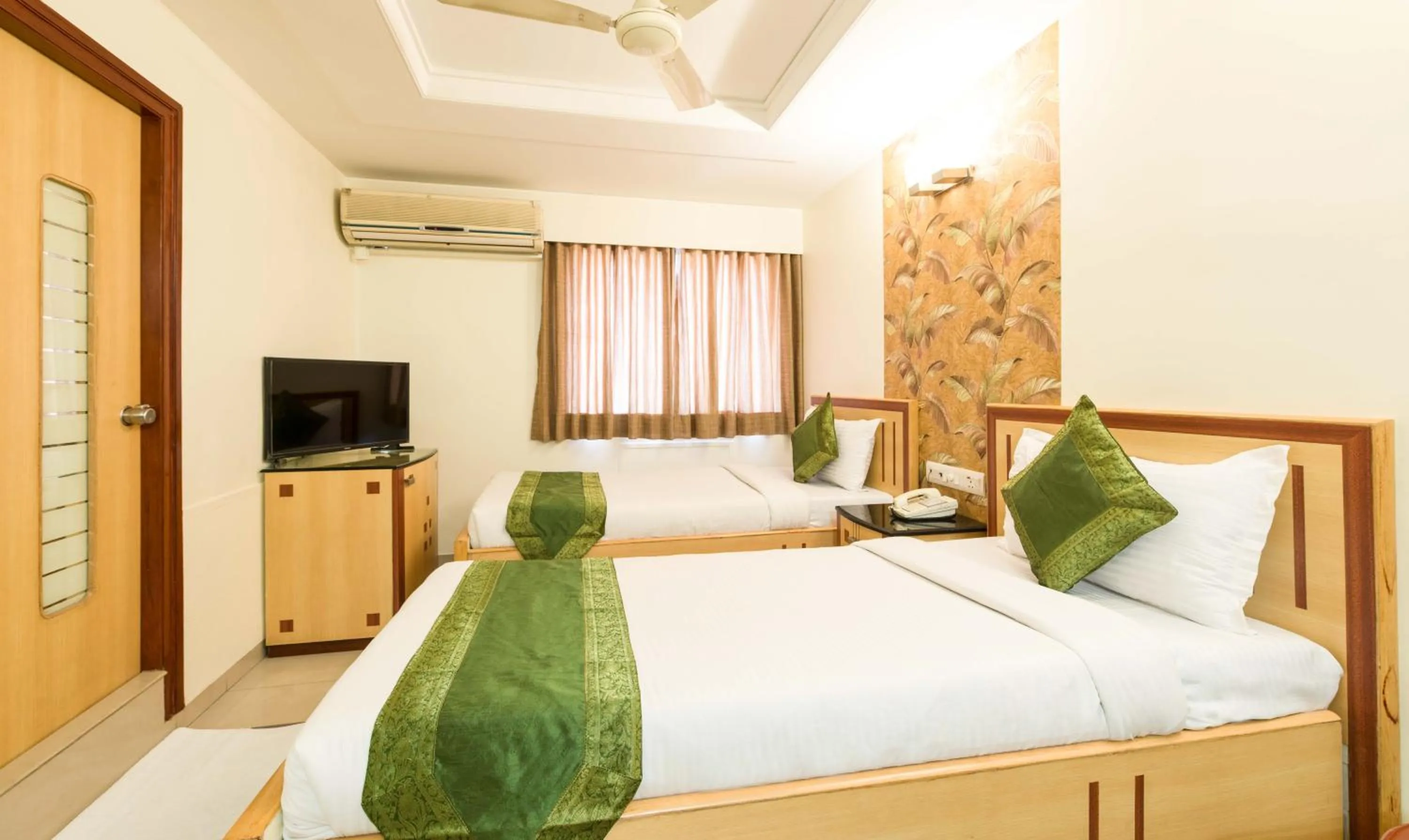 Bed in Treebo Paradise