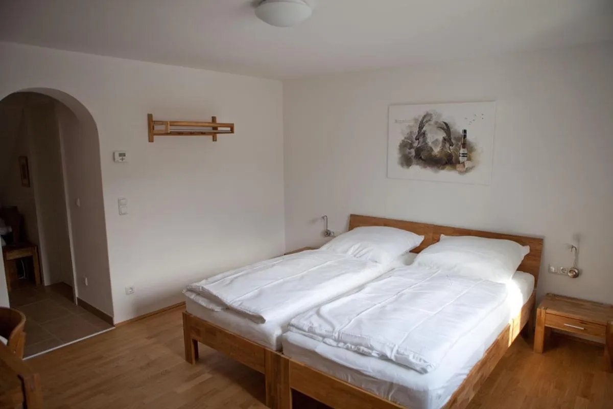 Photo of the whole room, Bed in Bierhotel Ranklleiten Almtal