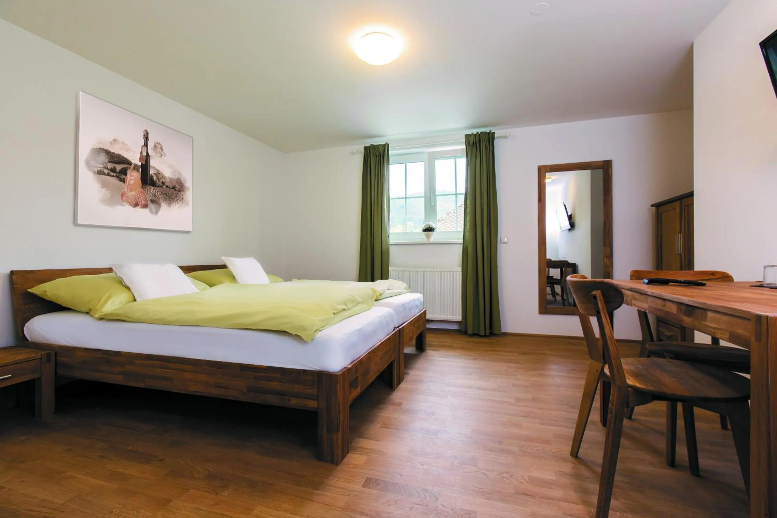 Photo of the whole room, Bed in Bierhotel Ranklleiten Almtal