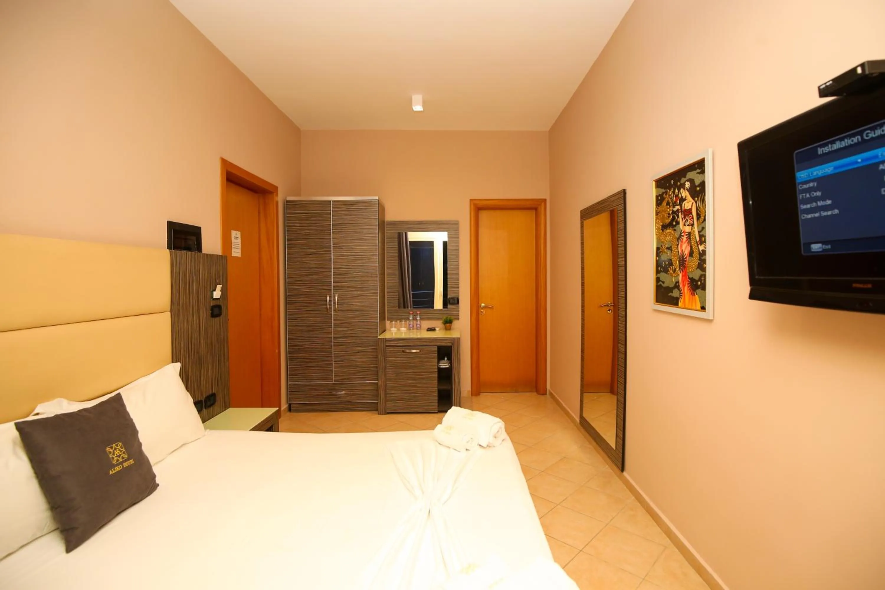 Communal lounge/ TV room in Aliko Hotel